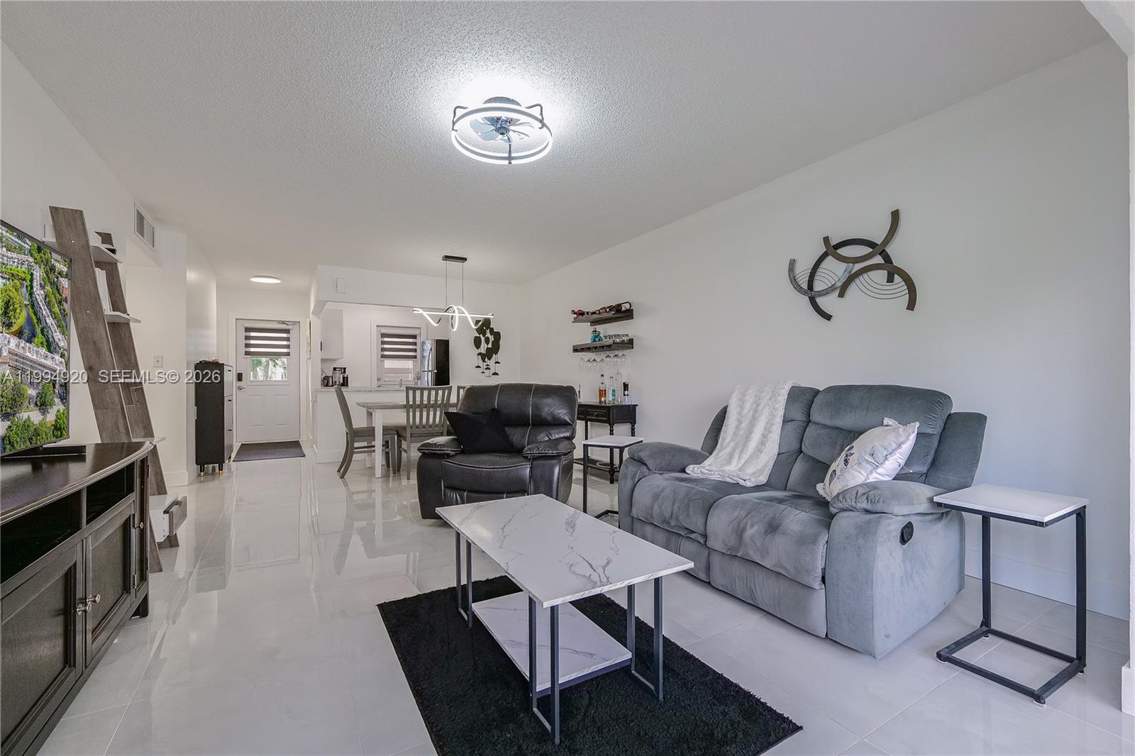 BEAUTIFUL FURNISHED TURNKEY 2/2 CONDO. COMPLETELY REMODELED. NICE RELAXING VIEW OF THE LAGOON. LOTS OF DAYLIGHT. MODERN TILES THROUGHOUT. BEAUTIFUL OPEN GOURMET KITCHEN WITH STAINLESS STEEL APPLIANCES. MASTER BATHROOM FEATURED AN ITALIAN STYLE SHOWER.  LOCATED IN THE DESIRABLE 55+ PHASE 8 OF HAWAIIAN GARDENS WHICH IS A VERY ACTIVE COMMUNITY WITH A LOTS OF ACTIVITIES. CLOSE TO SHOPPING, RESTAURANTS, PUBLIX, ALDI, PHARMACY, ETC. 15 MINUTES TO THE BEAUTIFUL BEACH OF FORT LAUDERDALE. 20 MINUTES TO THE AIRPORT. NO LEASE FOR THE FIRST 2 YEARS AND AFTER THAT PERIOD YOU CAN RENT TWICE A YEAR. EASY TO SHOW !!