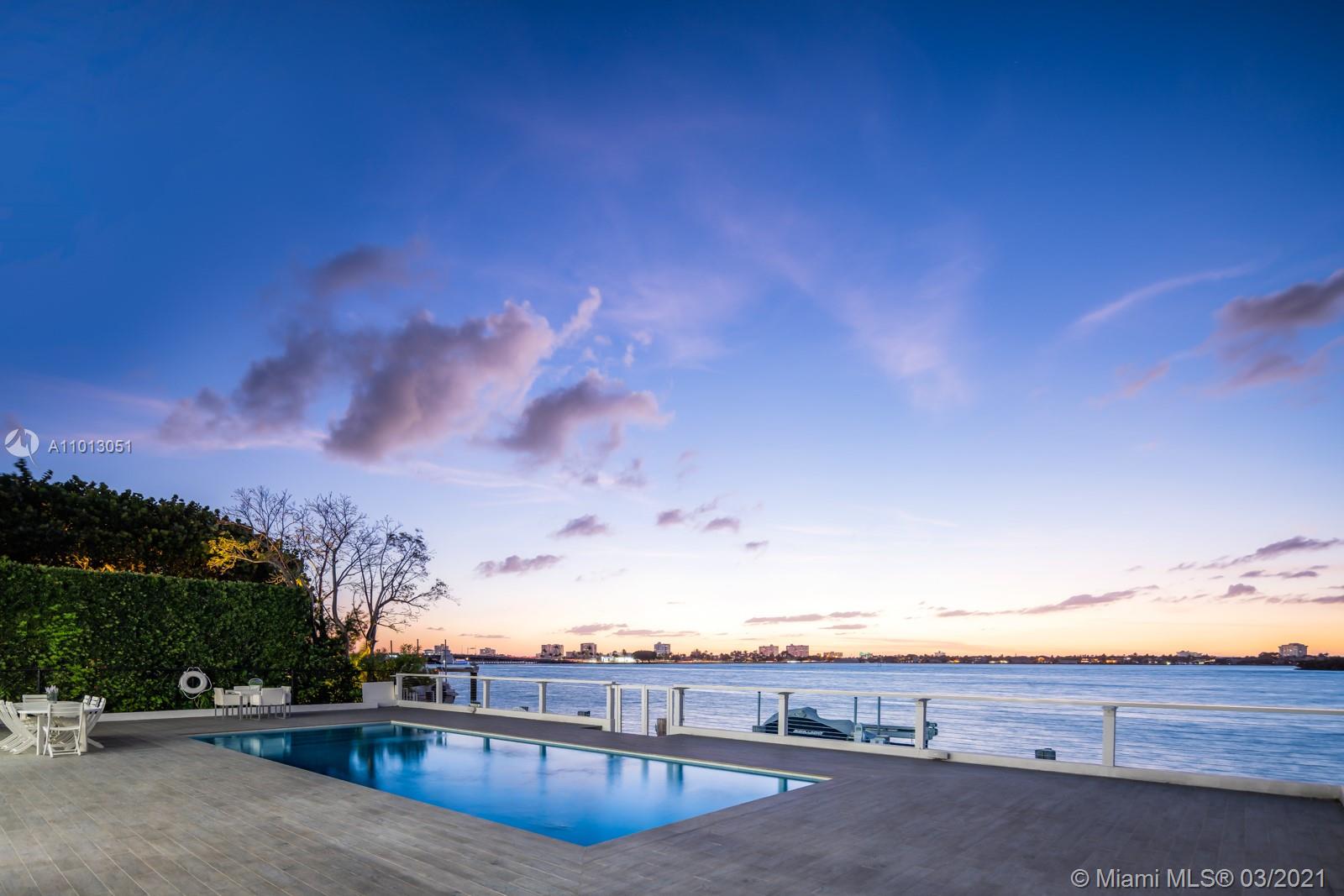 Welcome to Bay Harbour Island’s most sought-after views. Fully rebuilt in 2015,  this 7,800SF home is the perfect combination of Plantation Modern architecture & sits on a 13,125SF lot w/ elevator & 6 BD, 7 BA & 2 half baths, gym & media room. At entry you are greeted with a grand living room with 20’ ceilings, chefs kitchen with Subzero, Bosch & Miele appliances, 2 pantry’s and a thoughtfully designed indoor/outdoor integrated living space w/ wide open bay views with 75’ on the water and a private dock w/ boat lift. First floor Primary Suite w/ French doors out to the patio, 2 walk-in closets and large bathroom with jetted tub & shower. The Mezzanine level features 4 bedrooms w/ terraces, media room & gym. This Lutron smart home is fitted with integrated lighting, speaker & camera system.