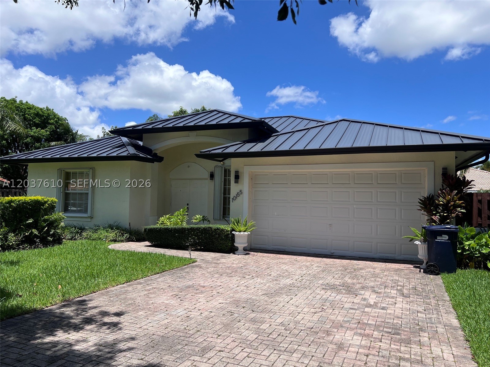 Spacious and bright 3-bedroom, 2.5-bath single-family one-story home in the Hammocks area. This home features many updates, including a 2-car garage, aluminum shutters, a newer roof, granite kitchen countertops, new appliances, and an extra refrigerator in the garage.Enjoy a split-bedroom floor plan, large backyard with mango trees, excellent schools, and nearby restaurants and shopping. Hurricane shutters throughout the home. Window curtains included.Easy to show. Fast approval. Call the listing agent anytime for showings.