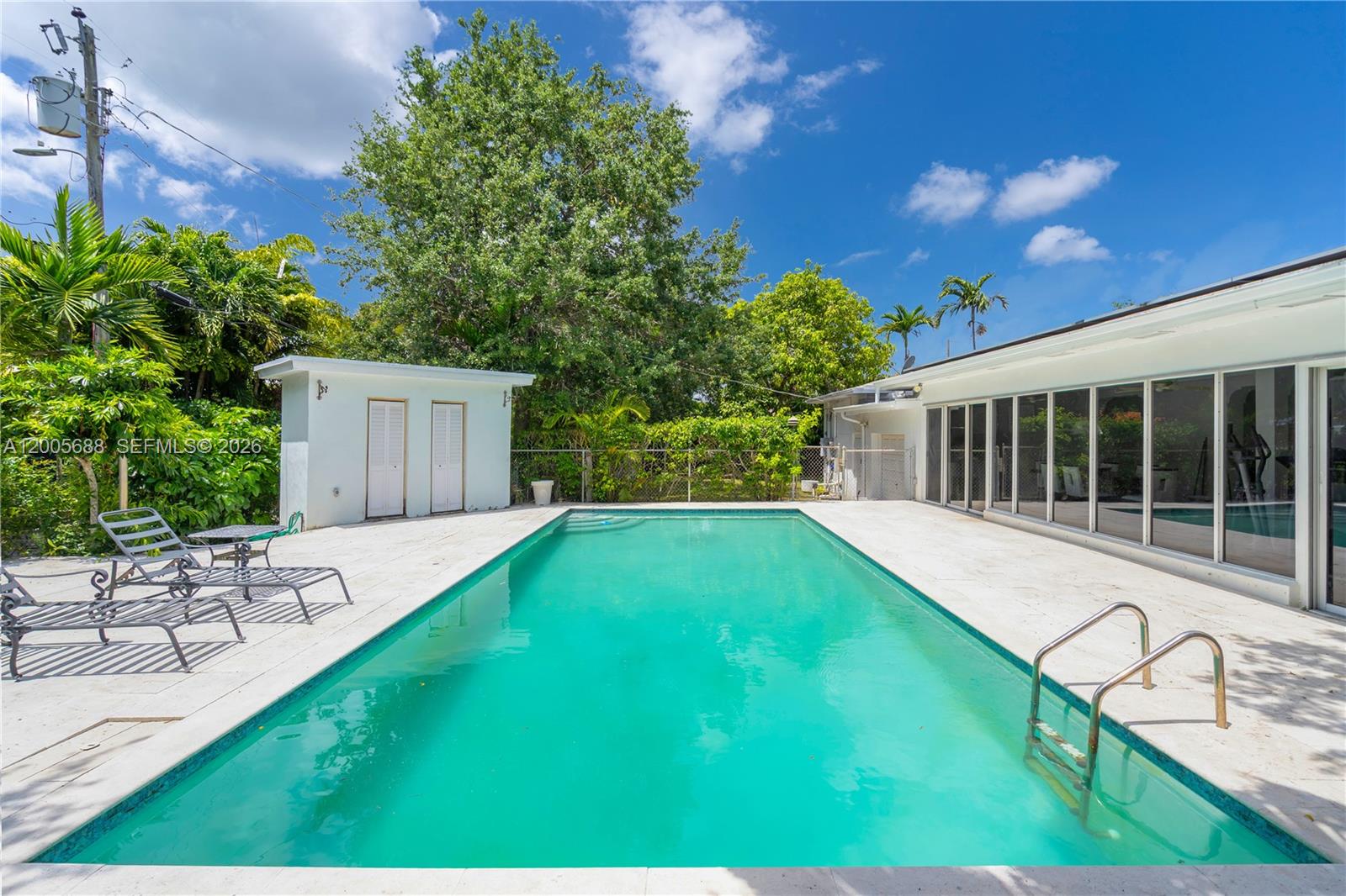 Discover this beautiful Miami Shores home for sale featuring 5 bedrooms, 3 bathrooms including the efficiency, and 2,892 square feet of living area under air on an oversized 15,250 sq. ft. lot. This spacious pool home in Miami Shores offers an updated kitchen, updated floors, and a beautiful remodeled pool (2020) with a large patio that is perfect for entertaining, relaxing, and enjoying the South Florida lifestyle.

This Miami Shores real estate opportunity also includes paid-off solar panels, helping keep electric bills around $30 per month, a whole-house generator, and partial impact windows for added convenience and peace of mind. The efficiency adds flexibility for extended family, guests, a private workspace, or additional use within the home’s total 5-bedroom, 3-bathroom layout.

Located in one of the most desirable neighborhoods in Miami Shores, FL, this home is surrounded by tree-lined streets, nearby top-rated schools, parks, shopping, and restaurants. With easy access to major expressways, this Miami Shores pool home is just minutes from Downtown Miami, the Design District, Wynwood, and the beaches.

A rare chance to own a spacious and energy-efficient home in Miami Shores with modern updates, a large lot, and an unbeatable location!

SELLER FINANCING AVAILABLE!