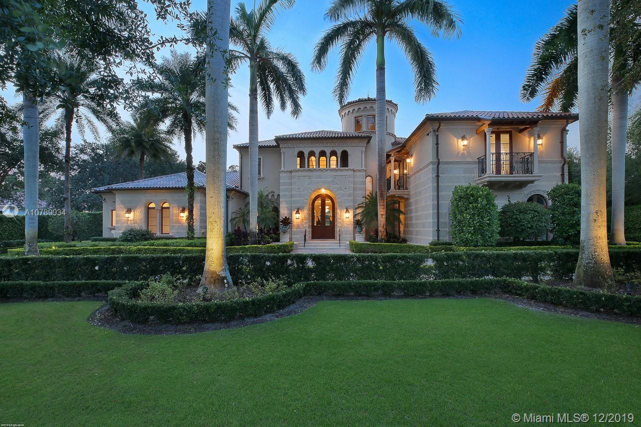 Grand Estate in Old Palm Golf Club with gorgeous panoramic views located on the 1st hole. This home boasts the finest craftsmanship & state-of-the-art features with 5 bedrooms 6 ½ full baths an elegant powder room, gourmet-chef's kitchen, wine cellar, home theater, imported Italian stonework, wainscoting, and gilded crown molding and generator. A first floor master suite is thoughtfully paired with his/hers separate baths and custom closets. A wonderful covered loggia with fireplace and summer kitchen for entertaining and enjoying the Old Palm Lifestyle with walking distance to the club house.