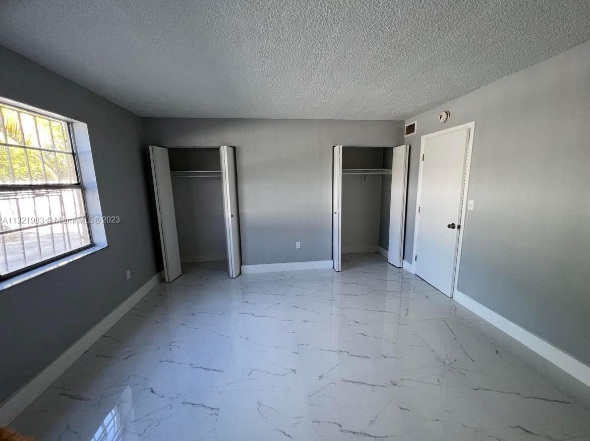 NEW WORLD CONDO APTS II - Residential Lease