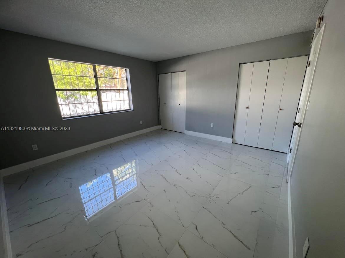 NEW WORLD CONDO APTS II - Residential Lease