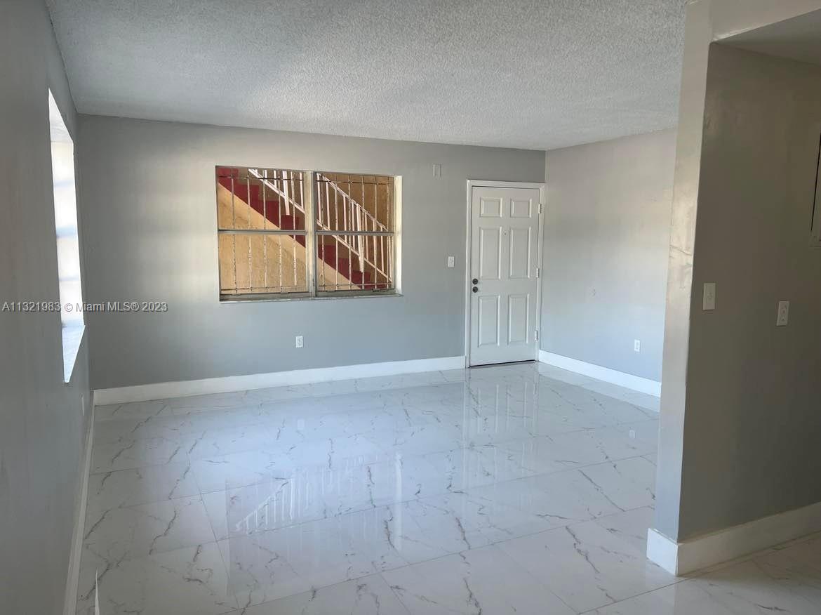 NEW WORLD CONDO APTS II - Residential Lease