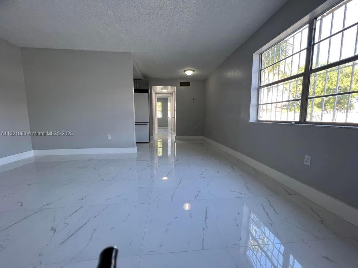 NEW WORLD CONDO APTS II - Residential Lease
