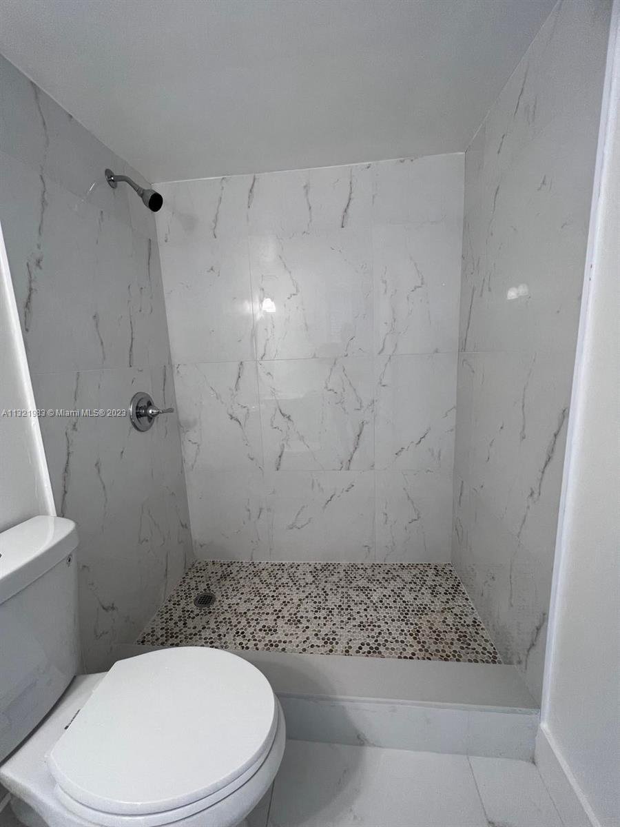 NEW WORLD CONDO APTS II - Residential Lease