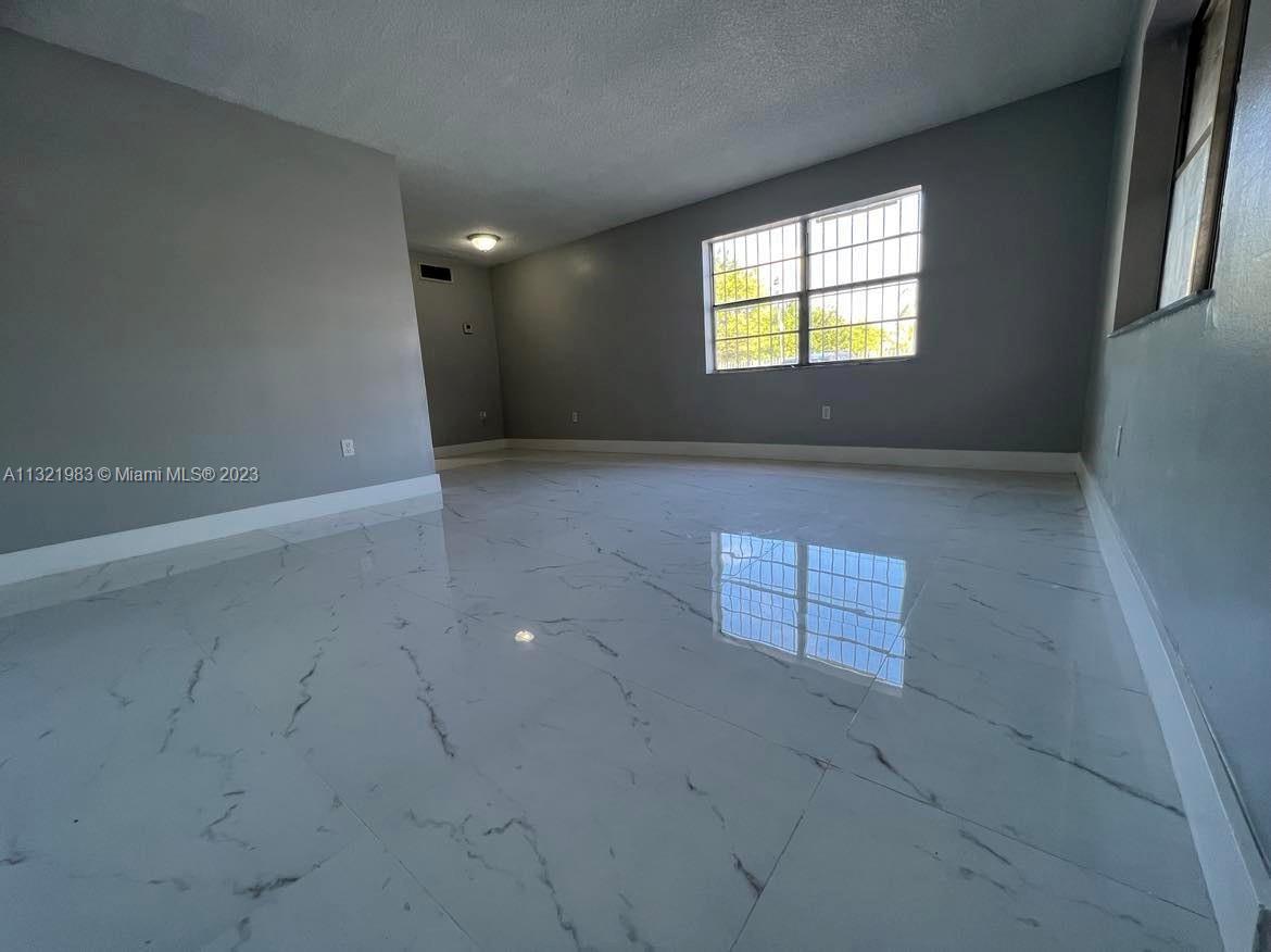 NEW WORLD CONDO APTS II - Residential Lease