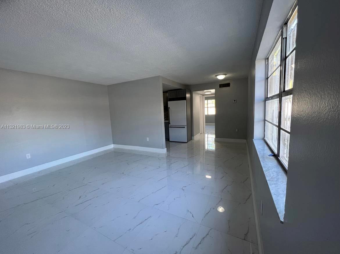 NEW WORLD CONDO APTS II - Residential Lease
