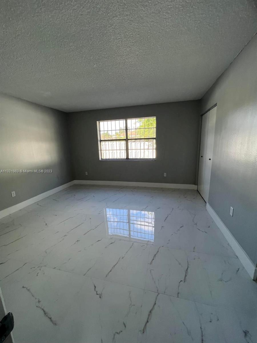 NEW WORLD CONDO APTS II - Residential Lease