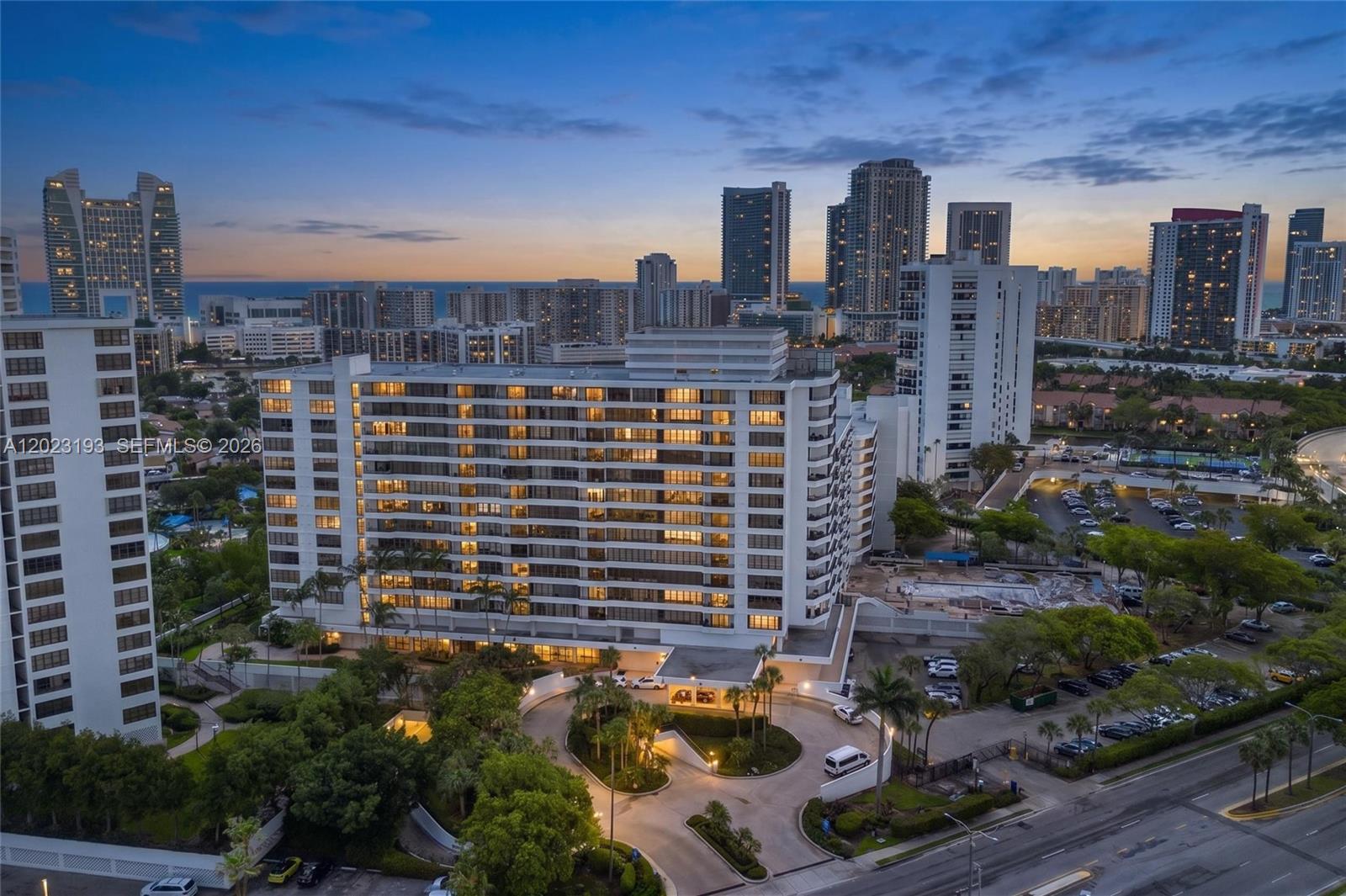 Enjoy stunning sunset views and sweeping horizon vistas from the private 10th-floor balcony of this spacious 2-bedroom, 2-bath residence in the highly desirable Olympus Condominium Complex. Offering approximately 1,400 square feet, this beautifully maintained condo combines comfort, style, and resort-style living in the heart of Hallandale Beach. The thoughtfully updated interior features a renovated kitchen with quartz countertops, breakfast bar seating for four, updated primary bathroom, custom-built entertainment center with included 65-inch TV, and custom walk-in closets in both bedrooms. Additional upgrades include a newer central A/C system, Nest smart thermostat, and bluetooth-enabled blackout shades throughout. Residents of The Olympus enjoy an exceptional amenity package including a newly renovated clubhouse, state-of-the-art fitness center, sauna, two heated pools, tropical garden walkways, tennis courts, 24/7 security, valet service, and marina access along the Intracoastal Waterway. Ideally located just minutes from Hallandale and Hollywood beaches, Gulfstream Park, shopping, dining, and entertainment. Furnishings may be available separately. Tenant occupied through September 30, 2026.