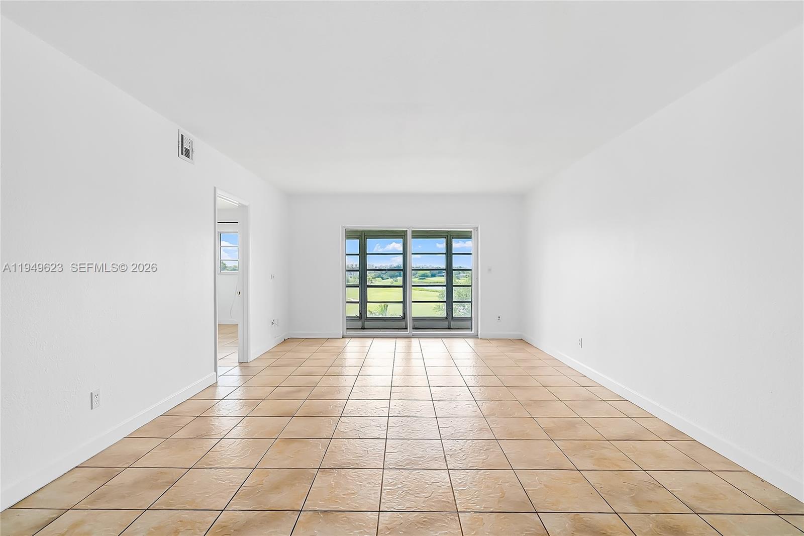 Welcome to your immaculate 2bed/2bath fourth floor apartment with unparalleled glass views of the lush golf course and tranquil lake. The apartment can be rented out in JUST 6 MONTHS after purchase. This bright and clean corner unit is more than just a home; it's a way of life.Imagine waking up every morning to the serene beauty of Arrowhead Golf Course located right outside your windows and enjoying your morning coffee on your balcony while enjoying the tranquil surroundings.Unit has parking and access to community pool. Recently updated bathroom, air conditioner Available immediately after HOA approval. Excellent unit with complete clubhouse, tennis, and pool area just steps away from the condo. The unit is rented for $1,800 until June 30, 2026.