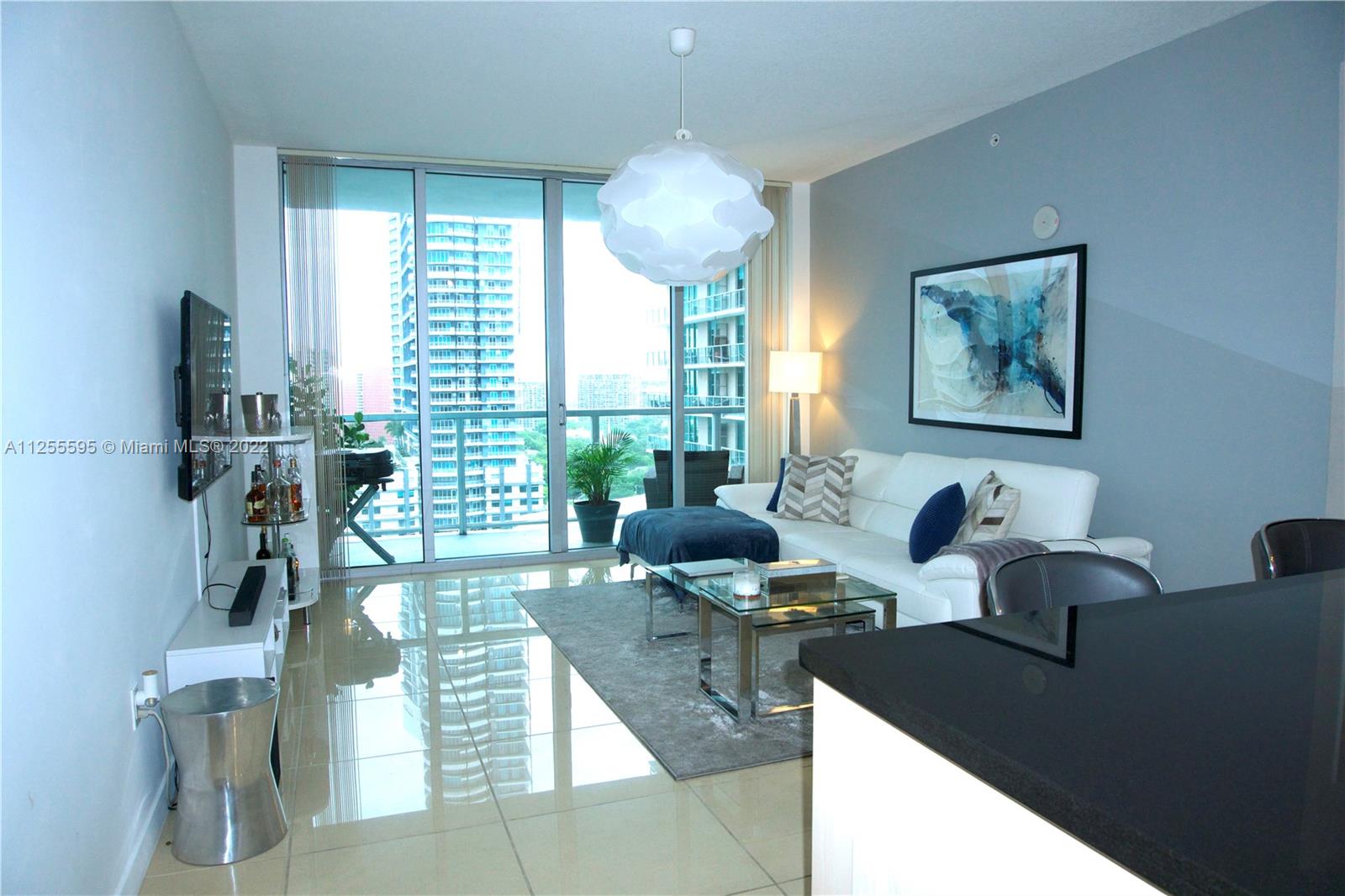 Axis Brickell unfurnished, tile floors with double sliding glass doors to blend indoor and outdoor living. Extra large balcony with SE exposure. Huge bathroom with shower and tub. Washer and Dryer in the unit. Kitchen has stainless steel appliances and open concept. Unit has one assigned parking space. Only one block from Mary Brickell Village and three blocks to Brickell City Centre. Across the street from Metrorail and Metro mover. Available after October 6th. Minimum one year leases, no short term. Landlord requires first, last and security. Tenant must also pay $500 common area deposit to the association. Please be aware of repairs either planned or taking place to the exterior of the building. Contact association for details.