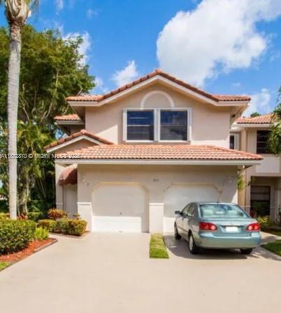 Stunning 4-bed, 2-bath condo townhome in a peaceful cul-de-sac! Freshly updated with brand-new vinyl flooring, a luxe primary bath, and a gorgeous kitchen with granite countertops and stainless-steel appliances. Enjoy a new roof, hurricane shutters, 1-car garage, and a brand-new water heater. Inside washer/dryer for convenience. The community boasts a pool, gym, tennis & basketball courts, clubhouse, and scenic fountains. With a tenant in place until May 2026, this is a fantastic investment opportunity. Don’t miss out on this turnkey gem!