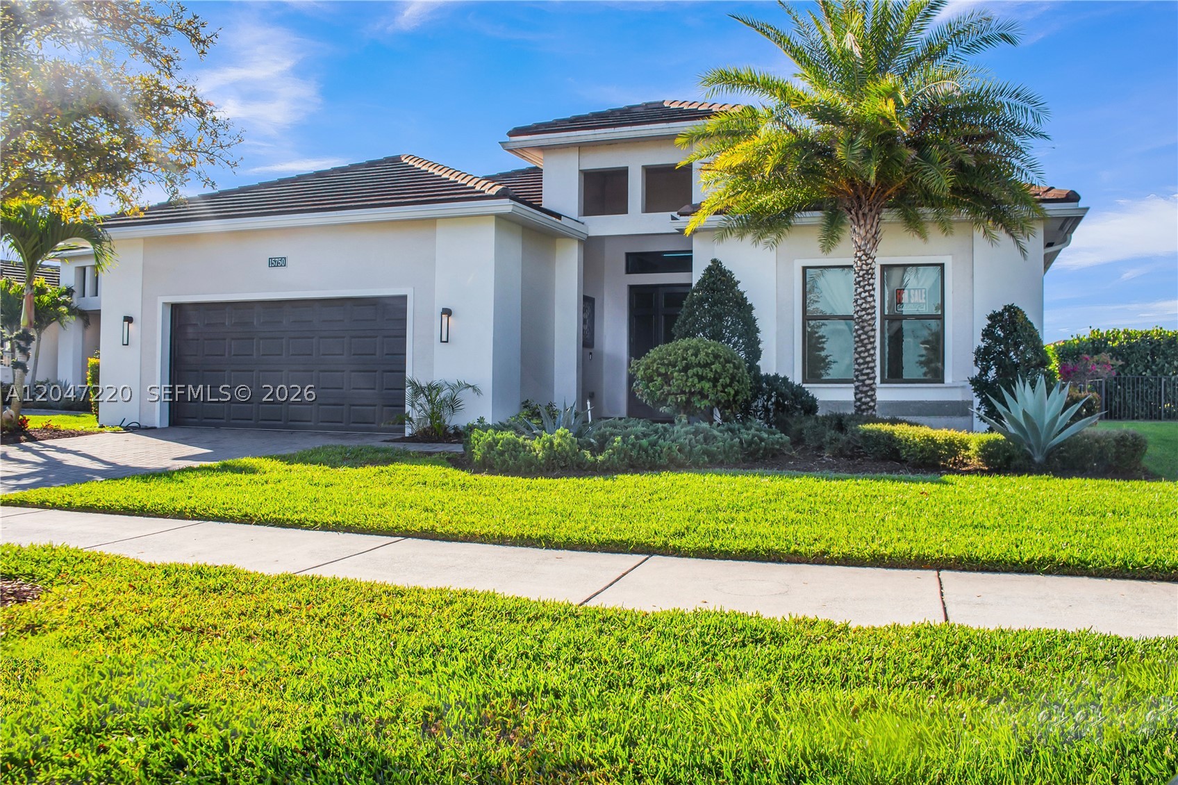 PRICE IMPROVEMENT! Exceptional lakefront Lake Vilano model in the desirable 55+ gated Cresswind at Westlake community. This move-in-ready home offers 3 bedrooms + oversized den, 3 bathrooms, an open-concept layout, soaring ceilings, Calacatta porcelain tile flooring, a gourmet kitchen with gas cooktop and large island, and a spacious primary suite with lake views and a huge walk-in closet. Enjoy the screened lanai with a built-in summer kitchen overlooking the water. Additional upgrades include a whole-house water filtration system and gas connection for a future pool. Resort-style amenities include a clubhouse, pools, pickleball, tennis, fitness center, walking trails, dog park, and more. Priced to sell—schedule your private showing today!
