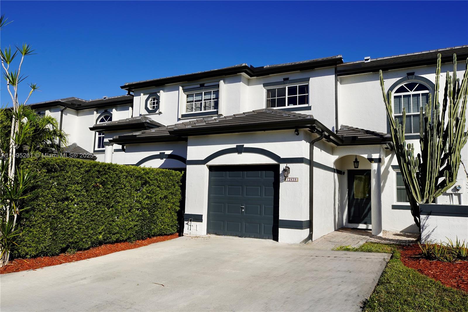Welcome to this beautiful 3-bedroom, 3- full bathroom townhouse in the sought-after Somerset Cove at Vizcaya. Enjoy a smart layout with one bedroom and full bath on the first floor, tile and laminate floors throughout (no carpet), and stainless steel appliances. Spacious bedrooms feature large closets, plus additional space ideal for an office. Upgrades include a 2023 roof, newer AC, PVC-fenced patio with pavers, and no rear neighbors—just a scenic canal view with a tranquil nature path, perfect for jogging, biking, or fishing. Additional perks: one-car garage with storage and hurricane impact windows. The gated community offers 24-hour security, a pool, and a playground. Prime location near great schools, shopping, and major highways.