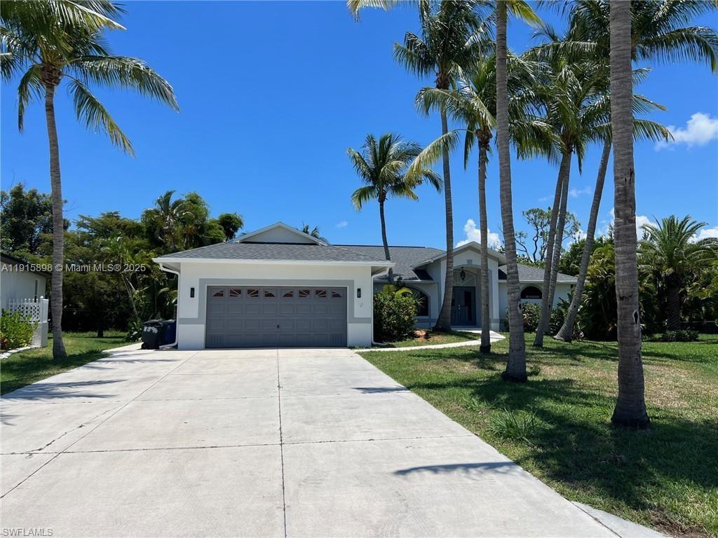 Super Private large, updated SF home on a preserve in a non-gated subdivision. 15 minutes away from Fort Myers Beach. Spacious & cozy house that includes a large family room with working fireplace, large living room & dining area next to kitchen. Master bedroom joins a master-suite or use it as a 5th bedroom or study. High ceilings throughout home. Enjoy your Roman style heated pool in your large mansard screened lanai area with total privacy. Back yard has coconut trees, a preserve & trees on the left and right of the house for bathing in complete privacy. The shingle roof was replaced 2 years ago. Beautiful porcelain tile floors throughout. Your only a few blocks away & walking distance from supermarket, shopping, banks, & religious Temple/Church. Put this house on your list to see.
