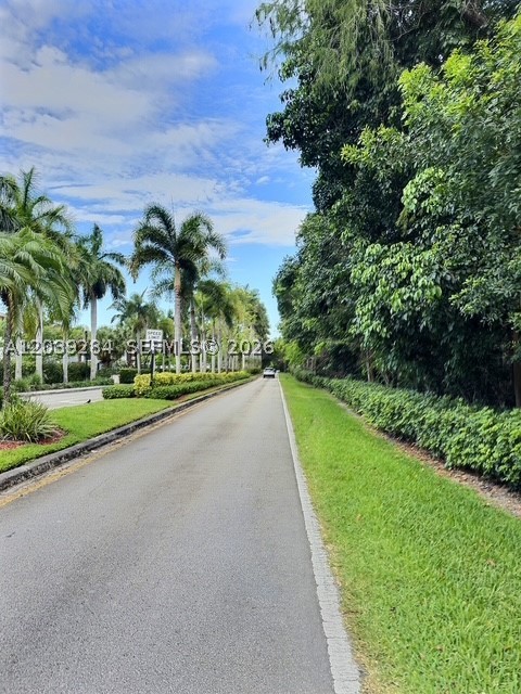 Beautiful first-floor corner unit in the heart of Coconut Creek. This move-in-ready condo features modern tile flooring throughout, spacious closets with custom cabinetry, and an in-unit washer and dryer for added convenience. The desirable corner location offers extra privacy and abundant natural light. Enjoy community amenities including a pool and fitness center. Ideally located near major expressways, shopping, dining, parks, and entertainment. A perfect combination of comfort, convenience, and lifestyle.
