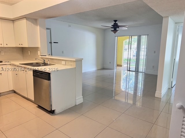 Beautiful first-floor corner unit in the heart of Coconut Creek. This move-in-ready condo features modern tile flooring throughout, spacious closets with custom cabinetry, and an in-unit washer and dryer for added convenience. The desirable corner location offers extra privacy and abundant natural light. Enjoy community amenities including a pool and fitness center. Ideally located near major expressways, shopping, dining, parks, and entertainment. Seller offering $5,000 toward buyer’s closing costs with full-price offer.