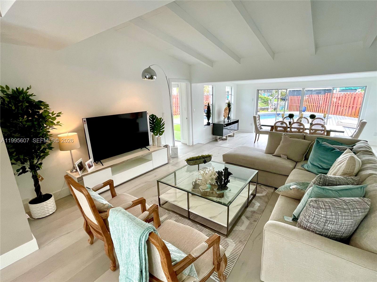 Beautiful waterfront home PROFESSIONALLY REMODELED on +9,700sf pie-shaped corner lot in the community of
Lauderdale Isles. 3bedr+2bathr, pool w new deck, 20' of waterfront and private boat dock, irrigation system & concrete
driveway.
Ample living & dining areas, Florida room, vaulted exposed beams ceilings.
High quality finishes, closet cabinetry, new modern bathrooms. 
Impact glass on front windows, waterproof vinyl flooring. Kitchen w new tops & SS appliances. 
Garage serves as a large storage & laundry area, full size new washer & dryer.
No HOA. Centrally located close to beaches, airports, highways, downtown Ft Laud, HardRock. 
[[ Property is shown completely FURNISHED & DECORATED. Furnishing & deco are for sale, for only $35,000 ]]
:: Recorded video tour available upon request ::