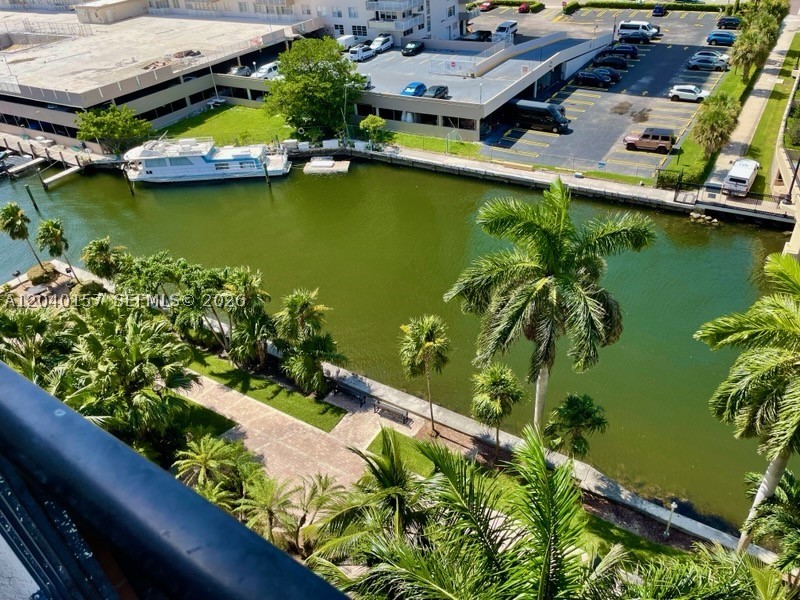 Gorgeous Penthouse top floor apartment with charming canal & coastal water views. Walking distance to the beach, restaurants & supermarket. Kitchen granite countertops, convenient washer & dryer inside unit. Guarded garage entrance & gorgeous lobby & amenities include gym, business center, yoga activity room, and beautiful pool with bay intercoastal views. Can be rented 3 times per year, minimum 4 month rental period.