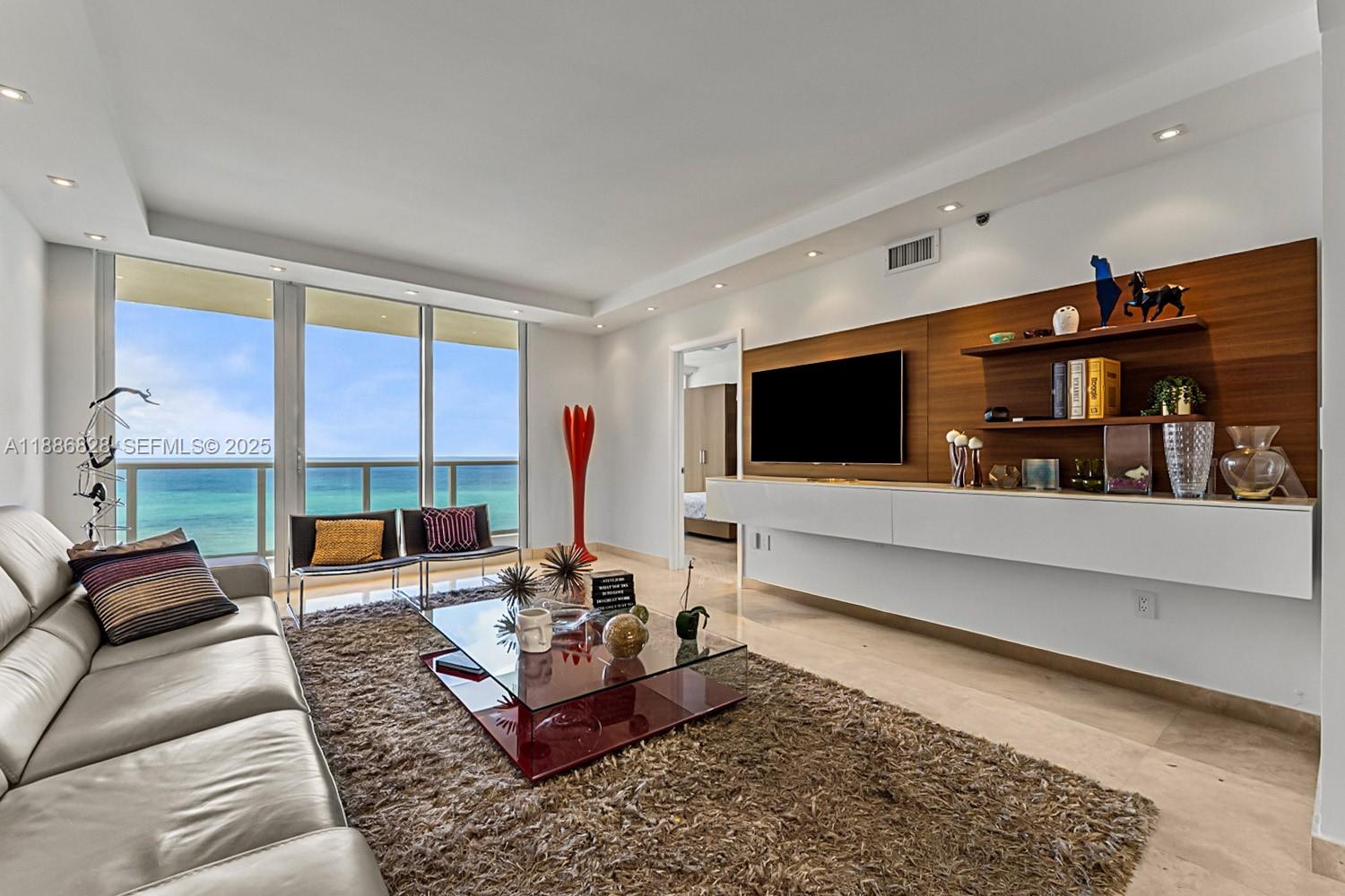 Experience breathtaking direct ocean views to the east and sparkling bay and skyline views to the west from this elegant 3-bedroom, 3-bath residence at Ocean One in Sunny Isles. Beautifully decorated with Italian and Addison House furnishings, this home features marble flooring throughout, just finished new kitchen cabinets and custom closets in every room, combining style and functionality. Ocean One offers five-star amenities, including private beach access, resort-style pool and hot tub, beachfront bistro and cabanas, barbecue area, children’s playground, tennis courts, fully equipped gym, spa and sauna, plus game and meeting rooms.
This residence is fully furnished, move-in ready, and perfectly suited for enjoying the best of oceanfront living. READY TO MOVE IN, BRING YOUR TOOTHBRUSH.