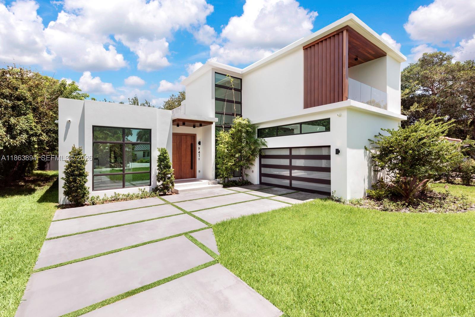 Brand New impeccably designed 5/5.5 home w/ grand indoor-outdoor living. Step through the front door to find yourself in your own private retreat nestled in deep green foliage. Every room is its own suite w/ spa like bathrooms, walk-in closets & bright open design. Enjoy flawless attention to detail w/ top of the line designer finishes incl a gourmet Eat-In Kitchen made for entertaining, Wine Storage, giant walk-in Pantry, Media Room & Open Dining overlooking lushly landscaped outside entertainment area. Nothing beats the resort feel of this saltwater pool, summer kitchen & cabana bath, all secluded in your own private Tropical Oasis. Lutron, Sonos, Smart Blinds/Doors, Security, Air conditioned 2-car garage. All in desirable Miami Shores, near MiMO shops, restaurants, A+ schools, parks