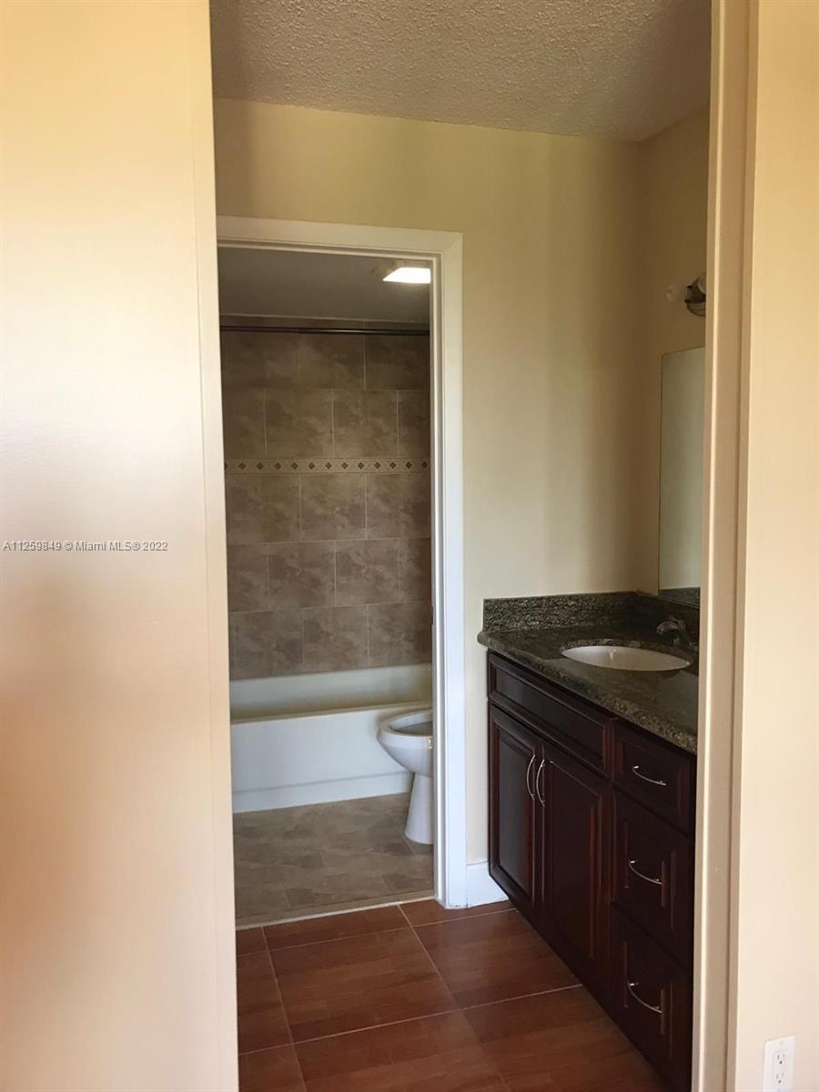 LAKES OF JACARANDA BLDG 1 - Residential Lease