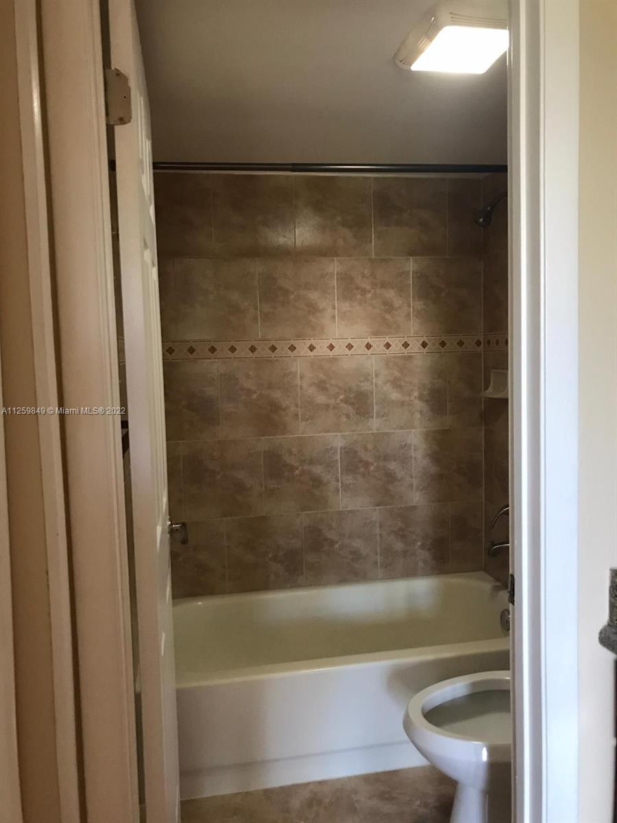 LAKES OF JACARANDA BLDG 1 - Residential Lease