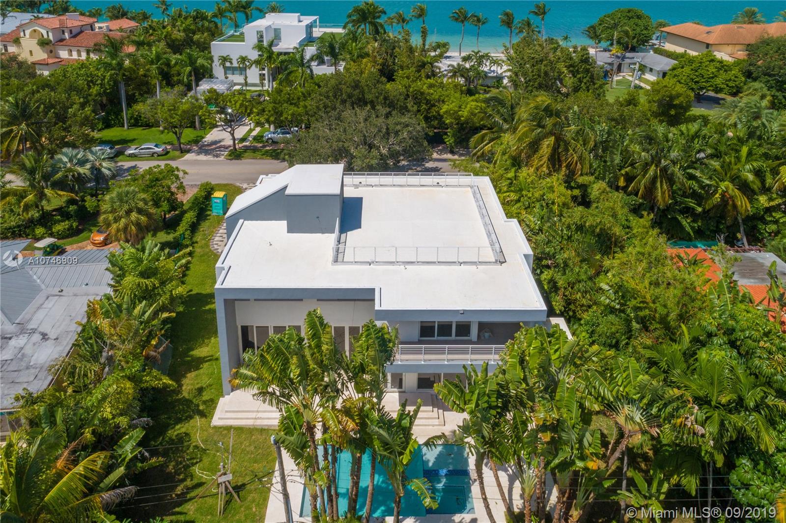 Brand New construction (2019) with an incredible oversized lot located on exclusive Harbor Drive.  This magnificent contemporary modern home has a very open floor plan with tons of natural light throughout.  With 9,258 Sq Ft of lot and 4,351 Sq Ft under A/C this jewel offers 6 bedrooms, plus office, 7 full bathrooms., 2 powder rooms, elevator to all 3 floors, stunning roof top terrace with some views of the bay and incredible ocean breeze, Italian kitchen and cabinetry, wood floors, wonderful closets and storage space,  gorgeous finishes and a wonderful driveway and carport to fit several cars. Enjoy the spectacular pool and garden area which has its own cabana bath and a wonderful terrace for those who like to entertain and live the most amazing luxurious island living at its best.