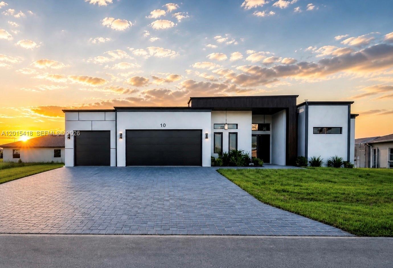 Experience the best of Florida living in this beautifully appointed modern home, ideally located in a highly sought-after area. Designed with style and comfort in mind, the residence offers 4 bedrooms, 3.5 bathrooms, and a 3-car garage, featuring soaring ceilings from 10 to 13 feet, high-end finishes, and a bright open-concept layout. The home includes a stunning primary suite with a spa-like bathroom, along with a private guest en-suite—perfect for visitors or extended family. Step outside to your own private retreat, complete with a screened-in pool and outdoor kitchen, ideal for entertaining or relaxing year-round in true Florida style, all set in a high-and-dry location for added peace of mind. Currently operating as a successful Airbnb, this property presents an exceptional opportunity to generate income from day one. Whether you’re seeking a primary residence, a vacation home, or a high-performing investment property, this home truly offers it all.