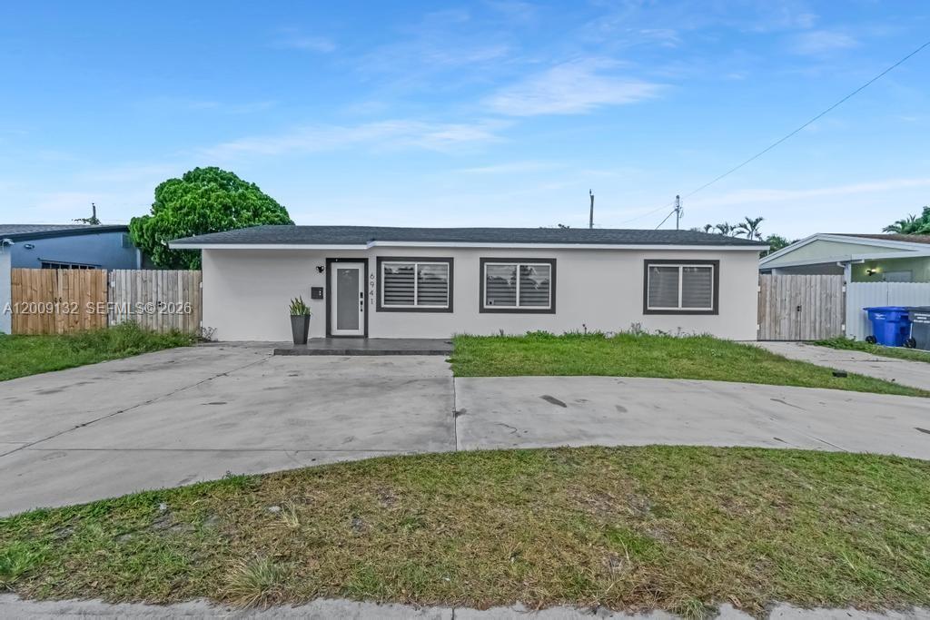 Fall in love with this completely remodeled 4-bedroom, 3-bath home in desirable Hollywood! Every detail has been
thoughtfully updated — including new electrical, plumbing, roof, impact windows & doors, fence and driveway for lasting peace of mind. Step inside to discover bright, open living spaces with modern finishes and a seamless flow that’s perfect for everyday living and entertaining. The spacious patio and terrace make outdoor gatherings effortless, while the versatile layout includes a bedroom with private access — ideal for an in-law suite, guest quarters, or home office. Truly move-in ready and designed for modern comfort and convenience. Property is larger that tax roll!!