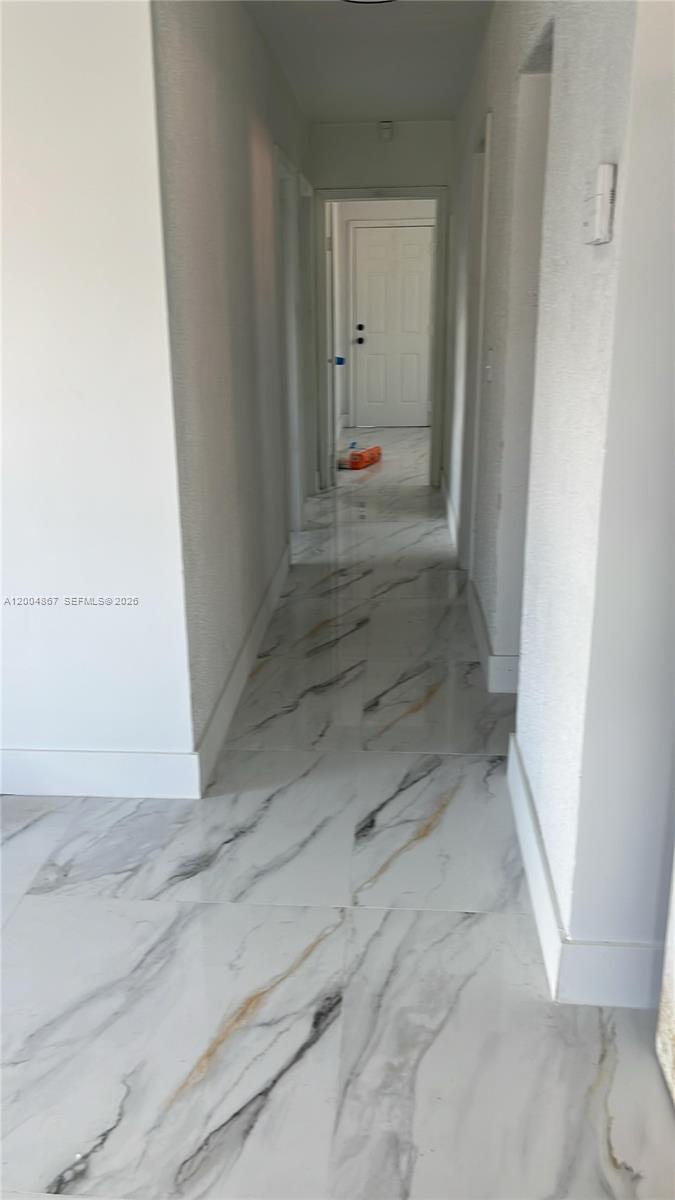 Remodeled Home !!!!! New Floor, New Kitchen, New Bathrooms, impact windows