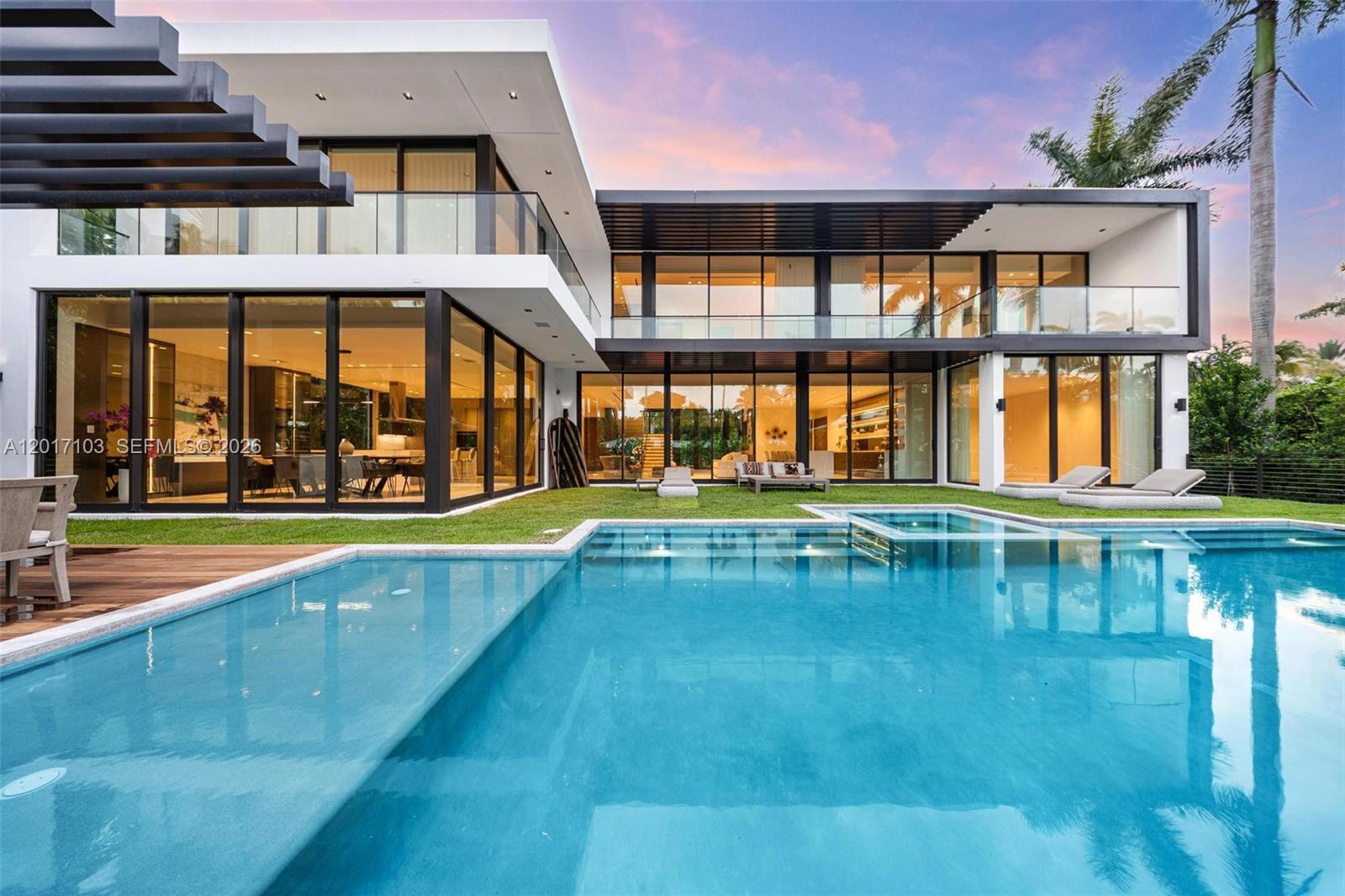Introducing a newly completed architectural masterpiece in one of Miami Beach’s most private and coveted residential enclaves.
Completed in May 2026, this exceptional residence offers 5,768 SF of impeccably designed interiors, plus a 500 SF garage, blending refined craftsmanship with effortless modern living.
Designed for the most discerning buyer, the home features 6 bedrooms (+ a small employee room) and 6 full baths, a private elevator, and a dramatic 40’ x 10’ resort-style pool, beautifully integrated into lush tropical surroundings.
Every detail has been thoughtfully curated, from bespoke millwork and natural materials to state-of-the-art appliances and elevated finishes, creating a home that feels both timeless and sophisticated.
The true luxury lies in the setting. Tucked away on one of Miami Beach’s most exclusive streets, the home offers privacy, tranquility, and discretion, surrounded by mature landscaping where the only sounds are the birds, yet moments from Miami’s finest dining, beaches, golf, and lifestyle destinations.
A rare offering where architecture, location, and serenity converge.

Disclaimer: Square footage is approximate and should be independently verified by the buyer and the buyer's representatives.