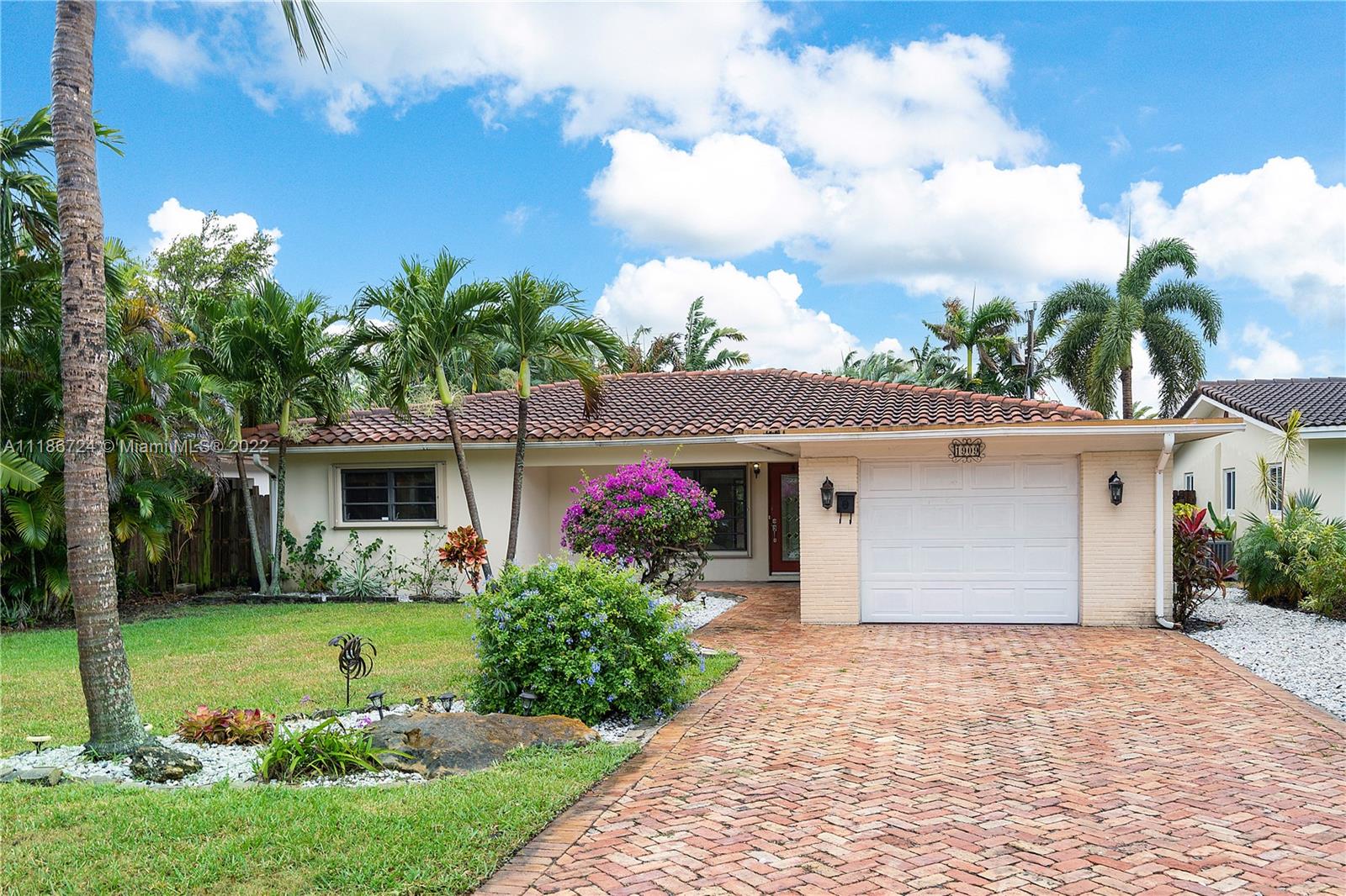 Spectacular opportunity in the highly prized neighborhood of Poinsettia Heights, located in the heart of Fort Lauderdale and only moments to restaurants, shopping and amenities.  Situated in a quiet established neighborhood and offering a rare opportunity for the perfect canvas to create your dream home.  This charming home features 2 oversized bedrooms each with walk-in closets, 2 bathrooms, a gorgeous Chicago brick driveway and a large backyard to create the ultimate entertaining space.  Additional features include a 2002 barrel tile roof, hurricane shutters and a separate laundry area.  If you are looking to live close to amenities or just a leisurely lifestyle close to the beach, this is the ideal home for you.