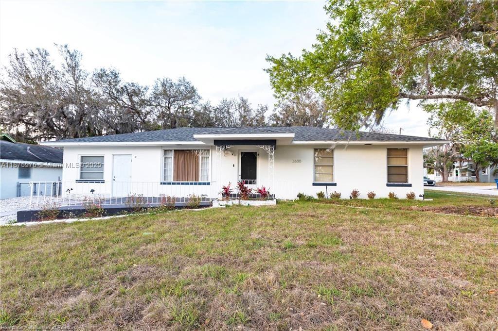 Charming 2-Bedroom Home on a Spacious Corner Lot in Sebring! This beautifully updated 2-bedroom, 2-bathroom home sits on a half-acre lot and is move-in ready with a brand-new roof, updated flooring, and fresh interior/exterior paint. The open layout features an updated kitchen with granite countertops, separate dining, and spacious bedrooms. A fully enclosed sunroom offers great versatility for relaxing or entertaining, while a separate laundry/utility room adds convenience. The home also includes an efficiency with its own entrance! Outside, enjoy a large backyard with a shed for storage and plenty of space for gardening, activities, or a future pool. Don’t miss this opportunity—schedule your showing today!