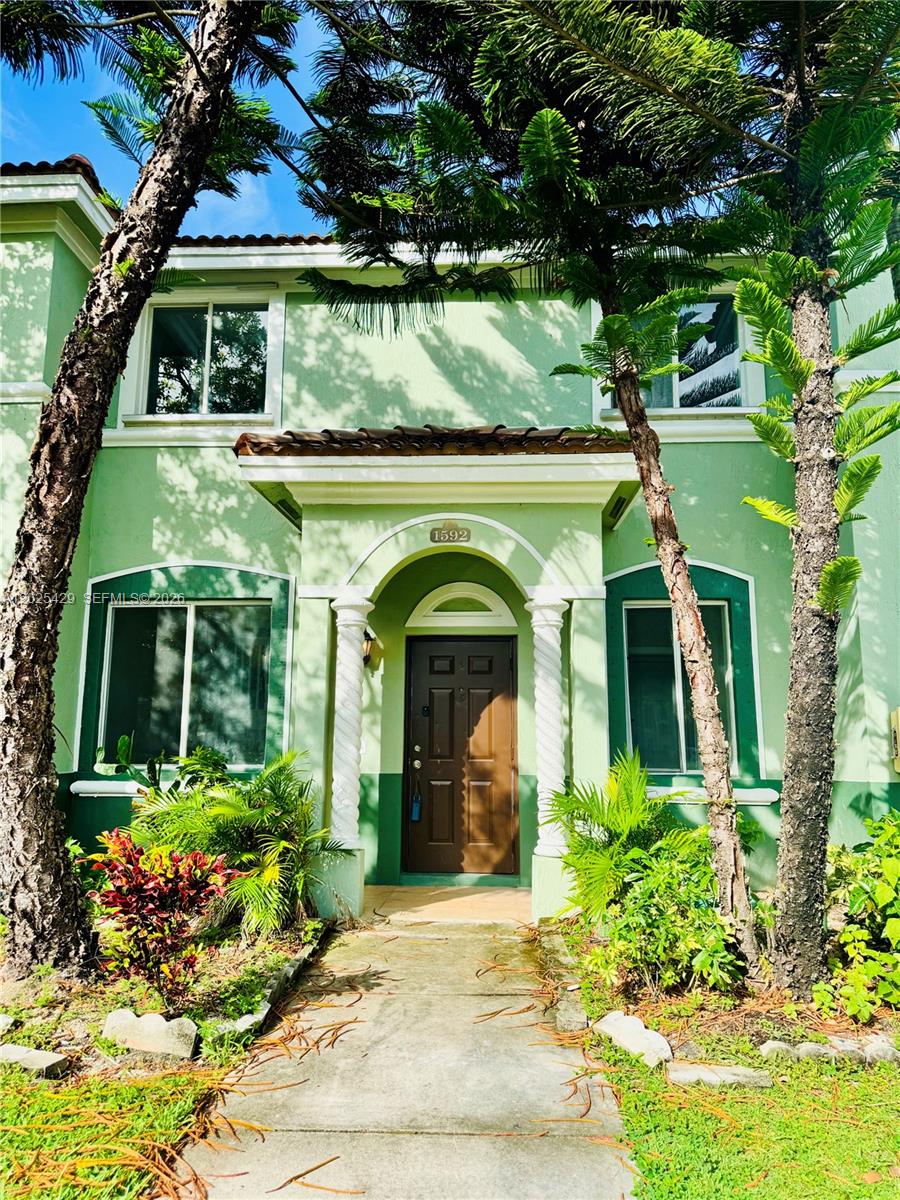 Welcome to this beautifully updated townhouse condo in the desirable Keys Cove community of Homestead! This move-in ready home features tile flooring throughout the first floor and brand-new laminate flooring upstairs, offering both style and durability. The modernized kitchen boasts newly updated cabinetry, countertops, and appliances, perfect for everyday living and entertaining. Enjoy refreshed bathrooms with tasteful upgrades and finishes. Conveniently located near major highways, shopping, dining, and schools, this property offers comfort, convenience, and value all in one. Don’t miss this opportunity to own a beautifully updated home in a gated community!