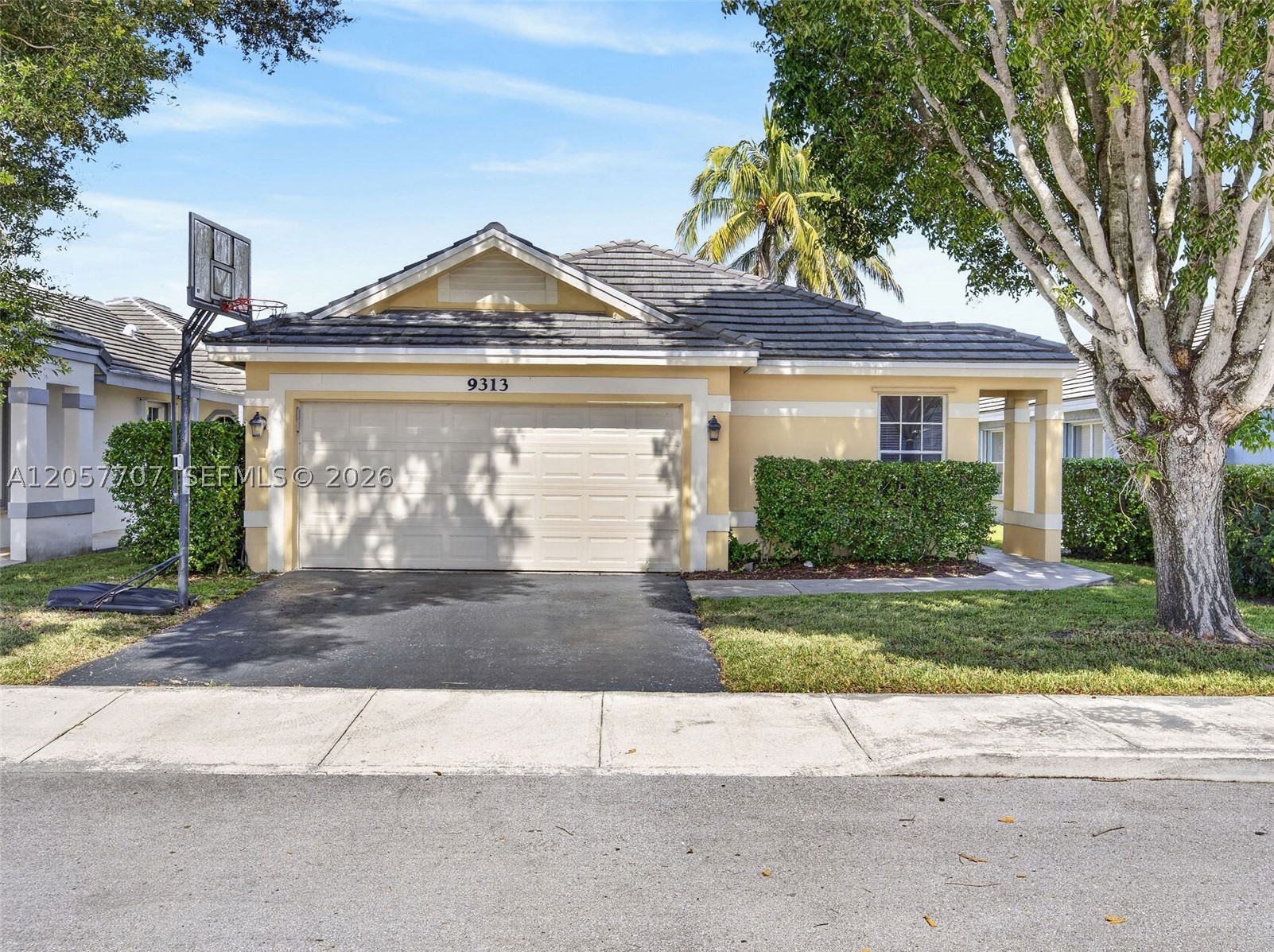 Welcome to Forest Ridge, one of Davie's most desirable communities! This beautiful one-story, lakefront home features 3 bedrooms, 2 bathrooms, and a 2-car garage. Enjoy beautiful water views from the oversized screened patio, perfect for relaxing or entertaining. Major updates include a new roof (2017), A/C (2017), and garage door (2017). The water heater was recently replaced, offering added peace of mind. Forest Ridge offers outstanding amenities, including community pools, tennis courts, pickleball courts, and scenic walking trails, making it an ideal place to enjoy an active South Florida lifestyle. Zoned for top-rated Silver Ridge Elementary, Indian Ridge Middle, and Western High School. Don't miss this opportunity to own a well-maintained home in this highly sought-after neighborhood! The home has been virtually staged in some interior photos to illustrate the potential of its spaces and furnishings