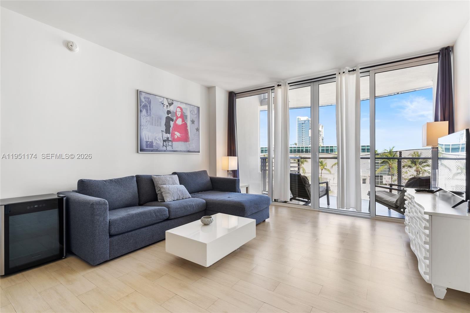 Spacious 1-bedroom, 1-bathroom corner unit with 767 sq ft in the heart of South Beach's Artecity community. This residence offers the perfect blend of luxury and convenience. Enjoy high ceilings and floor-to-ceiling windows that bathe the space in natural light. Italian bathroom features a floating glass shower, and the kitchen boasts sleek Italian cabinetry and stainless steel appliance, private patio ideal for relaxing or entertaining guests. washer and dryer for added convenience, Enjoy complimentary beach chairs and umbrellas for a beach experience. Valet service ensures hassle-free parking. Artecity's central location places you within walking distance of the beach, Collins Park, and the vibrant shops and restaurants on Lincoln Road, this condo offers the ultimate South Beach lifestyle.