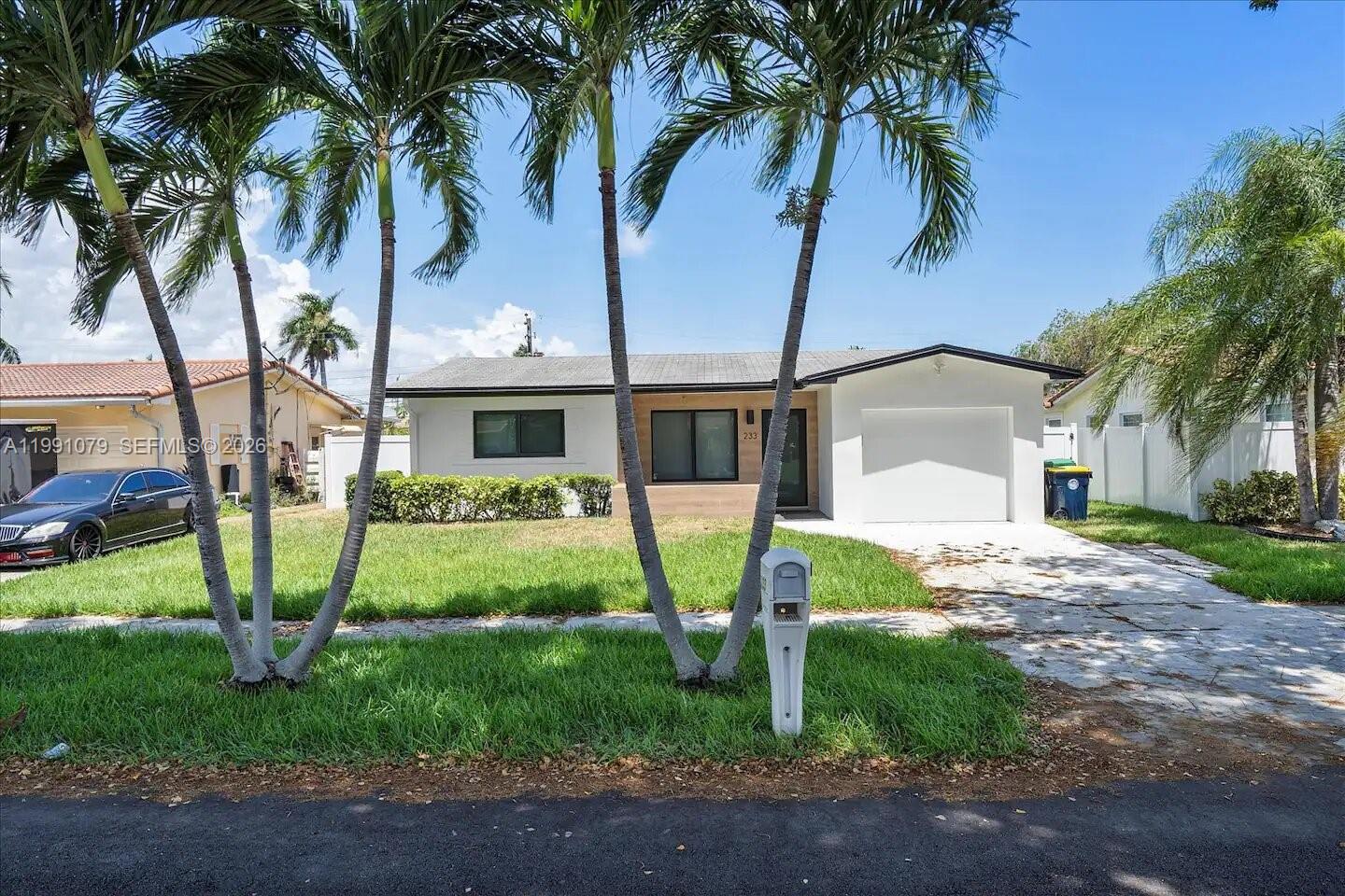 Completely remodeled turnkey property is perfect as a primary residence, vacation home, or investment opportunity. The home is being sold fully furnished, offering a seamless move-in or rental-ready experience.
Recent upgrades include impact windows and doors, new A/C, water heater, washer and dryer, updated electrical panel, and PVC plumbing. The home also features a new impact garage door and a fenced backyard with durable white vinyl fencing, ideal for privacy and outdoor enjoyment.
Professionally decorated with high-end finishes, the interior showcases designer wallpaper, modern Lumina baseboards, custom-built closets, window shades, LED recessed lighting, and ultra-quiet ceiling fans. Enjoy a relaxing screened patio, perfect for indoor-outdoor living.
Located in prime East Dania Beach, just minutes from Dania Pointe, shopping, dining, and entertainment, with quick access to the beach — this is a beautifully upgraded home offering both comfort and convenience. Tenants till July 29 2026