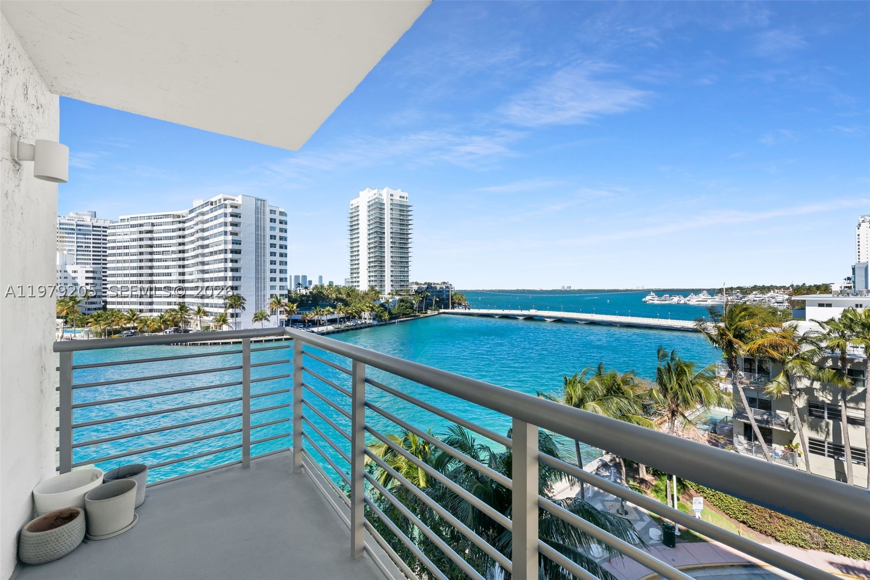 Prime Miami Beach location with stunning bay and skyline views! Live on Lincoln Road in this beautifully updated 1-bedroom, 1-bath condo perfectly positioned to capture breathtaking vistas of Biscayne Bay & the Miami skyline. Step inside to a bright, open living space where large windows frame the sparkling bay and fill the home with natural light. Contemporary porcelain flooring adds a clean, modern feel, while the thoughtfully designed layout makes the most of every square foot. Enjoy your morning coffee while watching boats glide across the bay, or unwind in the evening as the Miami skyline lights up the horizon. The residence offers the perfect balance of comfort, style, and location.Situated in a boutique waterfront building, amenities include a heated bay front pool, assigned parking, guest parking, bike storage & a shared storage room. The building’s prime Miami Beach location places you just moments from world-class dining, shopping, fitness studios, and everyday conveniences. Seller said all reasonable offers will be entertained! Schedule your private tour today!