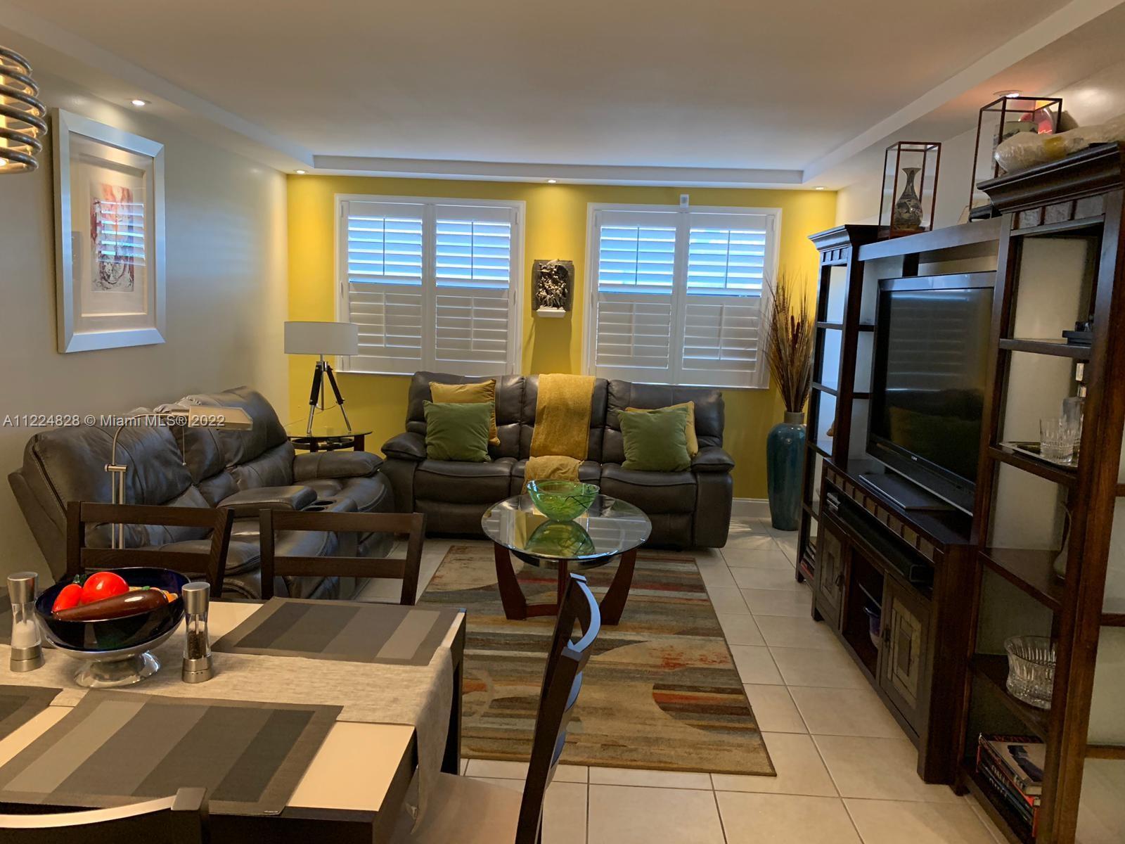 Large and spacious unit at Las Vistas at Doral! By far, one of the best remodeled units in this community. Stainless steel appliances, modern cabinetry, ceramic tile, large social area plus two large master bedrooms, each with walking closet including built-in cabinetry. Beautiful details all over the place, make it an amazing space to live. Las Vistas is a gated community in the Downtown Doral Area that offers four swimming pools, tennis and racquetball courts, gym and clubhouse with party room and barbecue area. Close to everything!! Steps away from Downtown Doral dining and entertainment venues, access to Doral's A+ schools. Minutes from all major highways!