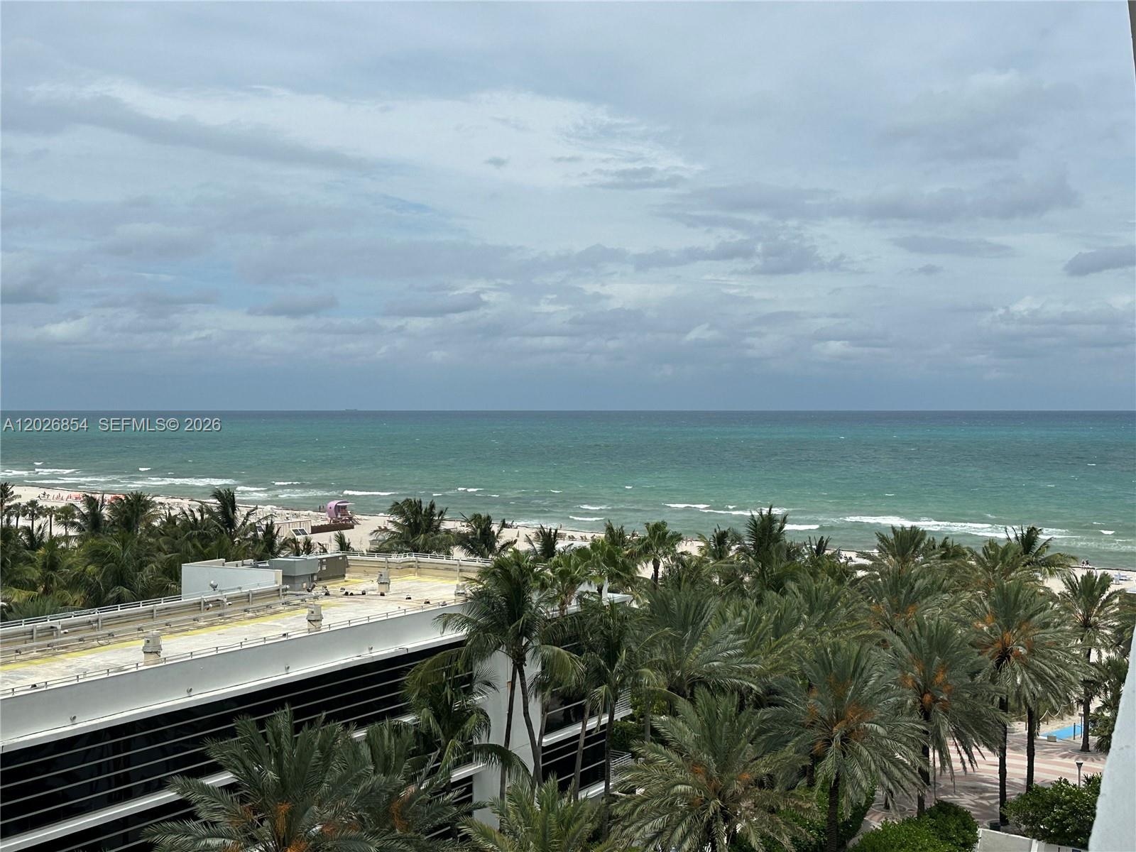 Beautifully updated one-bedroom condo with stunning beach views and a private balcony. This bright and spacious residence features a large open floor plan, modern finishes, and elegant white marble tile throughout. Enjoy comfortable coastal living with generous living space, private parking, an attended lobby, and excellent building amenities. Ideally located on the beach, this condo offers the perfect blend of style, convenience, and lifestyle.