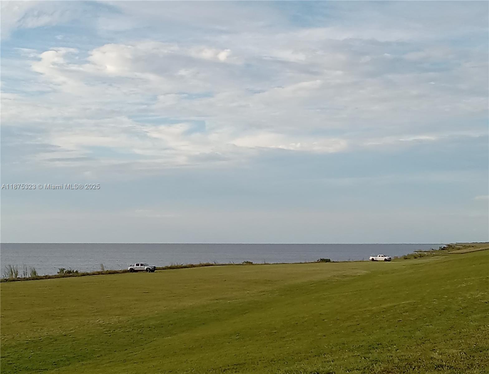 Great Location! Boating and fishing paradise! Directly on SR 98, near main highways, only a 35 minutes' drive to West Palm Beach or Port Saint Lucie. Built your dream home on this waterfront +- 2 acres residential plat of land with access to Atlantic Ocean and Golf of America, thru Okeechobee Rim canal. It is located near Port Mayaca and Florida National Scenic trail.