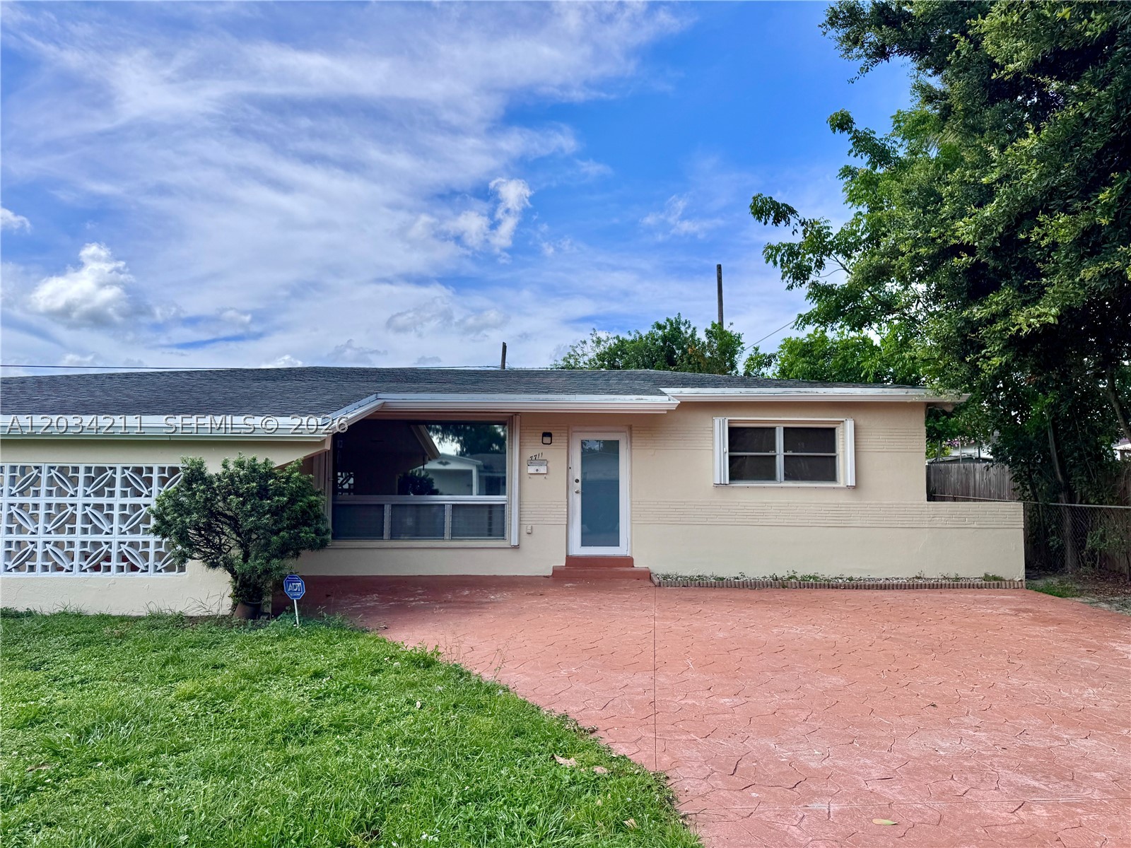 Lovely and spacious three-bedroom, two-bathroom home featuring a huge family room and a driveway with space for three to four cars. Centrally located near top-rated schools, Publix Super Market, Sam's Club shopping, dining, and major highways. Large backyard with plenty of room for outdoor entertaining. Must see! Priced to sell!