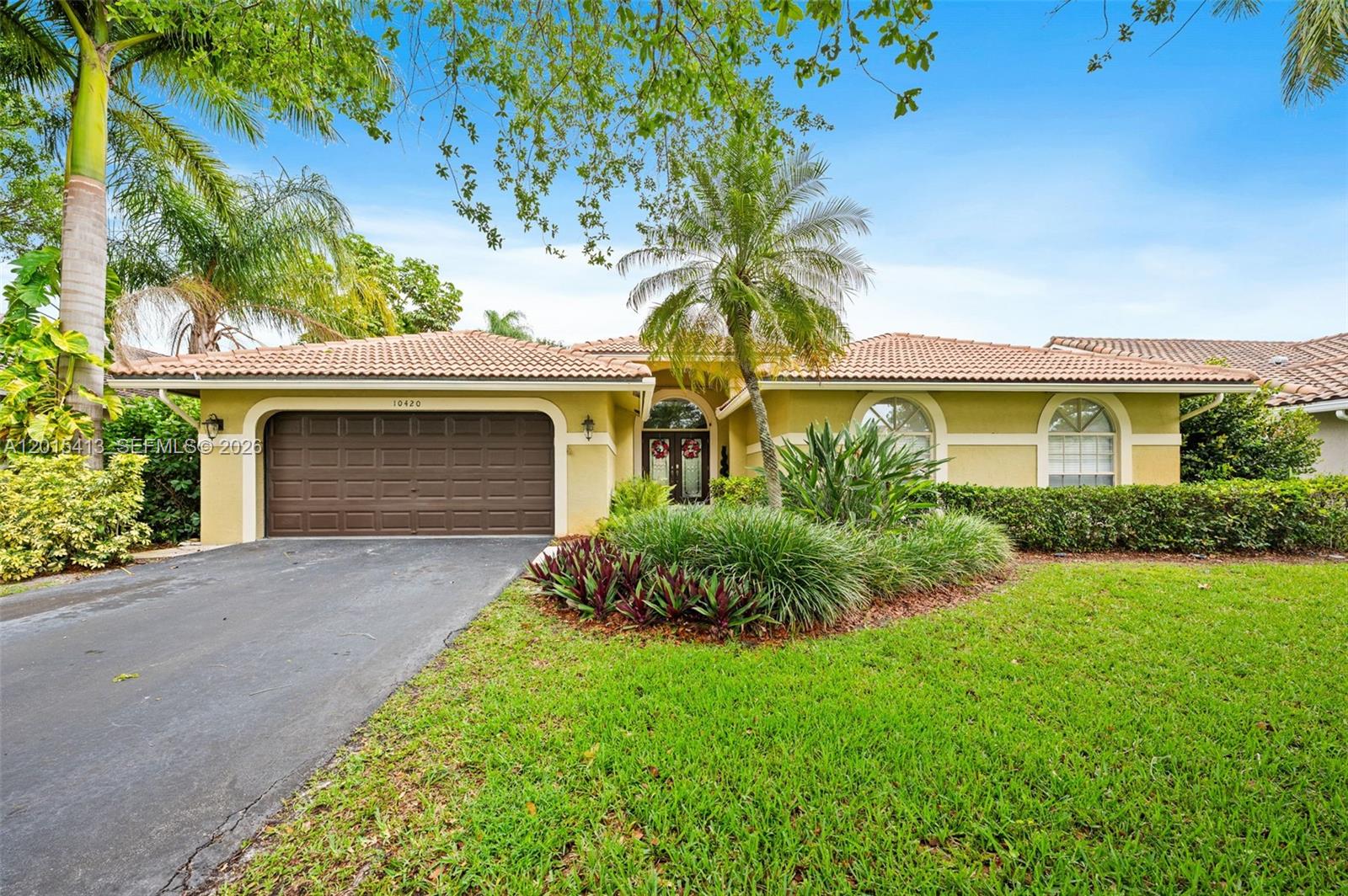 Elegant home sits on an oversized lot with a screened enclosed freeform pool and heated spa. It’s breathtaking from the minute you drive up!! Bright & airy with a palette drawn from the sand & shells, it whispers “summer” all year round. Step through the impact glass front doors into an immaculate home and you are greeted by volume ceiling and gorgeous newly installed flooring throughout. Large formal sunken living room with custom wall shelving and designer wall tiles. A spacious dining room with recently installed wall trim, great for indoor parties. Oversized family room updated kitchen with newer appliances & granite counters overlooking the pool area. Step outside to a large covered & screened enclosed patio with a sitting area and separate dining space perfect for entertaining visitors or pool parties. Outdoor space boasts its recently renovated pool and heated spa. The home also has newer baseboards throughout, custom cabinets & crown molding in the 4th bedroom and laundry room, laundry tub, newer AC unit, brand new water heater, renovated half bath and much more.. The 4th bedroom is being used as an office.