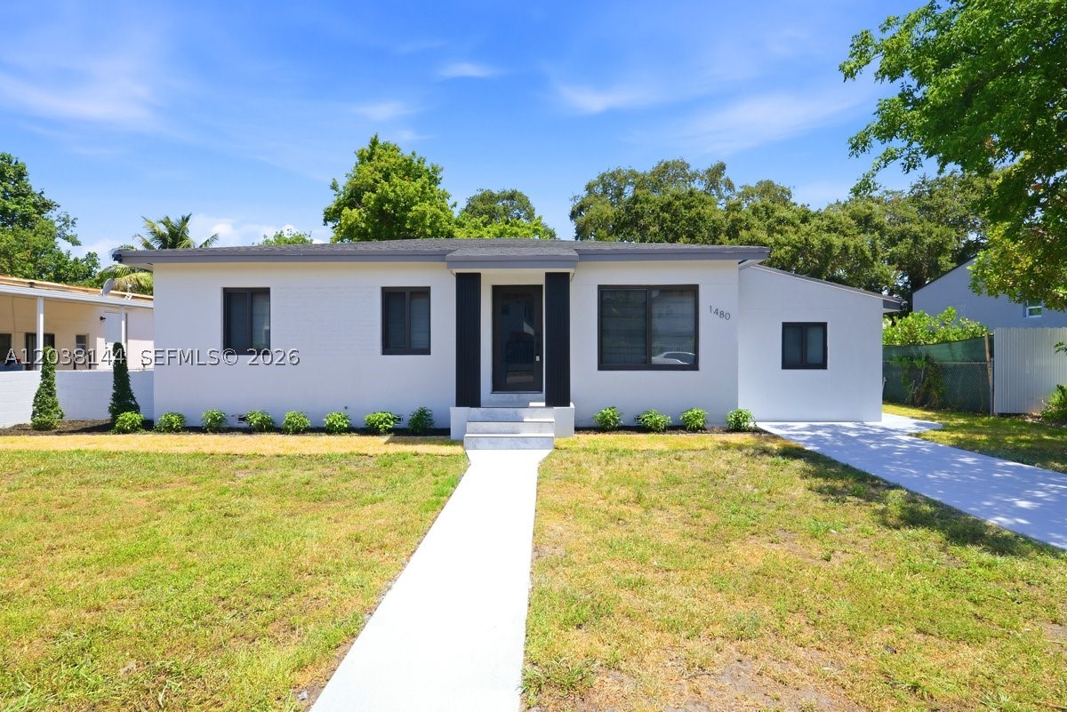 Beautifully renovated 4-bedroom, 2-bathroom home in Miami featuring a modern design and stylish finishes throughout. The updated kitchen comes fully equipped with all appliances included, and the home offers washer and dryer hookups for added convenience. Ideally located near FIU Biscayne Bay Campus, this property is just minutes from Sunny Isles Beach, Aventura Mall, and a variety of shopping centers, restaurants, and entertainment options. Move-in ready and perfectly situated in one of Miami's most convenient locations, this home offers the ideal combination of comfort, style, and accessibility.