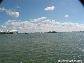 Widest of wide bay views! Unique waterfront opportunity in gated Historic Morningside . Best unobstructed view between islands of Miami Beach millionaires row from Morningside. Build your waterfront dream home! Historic district has allowed tear down of two waterfront Morningside homes. One of six of twelve waterfront properties in Morningside that has private backyard without public cul du sac or multi-family development bordering it. 4/2 single family with free standing two car garage currently permitted apartment great in law quarters laundry in rear. Wood flooring & original solid mahogany paneling in living and dining areas, new historic district approved barrel tile roof, 10 ft deep swimming pool, dock w/cradle boat lift & boat house, lushly landscaped property with huge back yard.