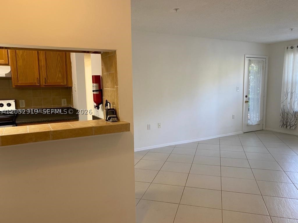 2 bedrooms, 1 bath on first floor unit. Gated Community, Washer & Dryer inside, resort style pool, exercise room, tennis court, great location. the Condominium was renovated, all assessment paid by the Seller . Tenant occupied until March , 2027 $1850.00 per month