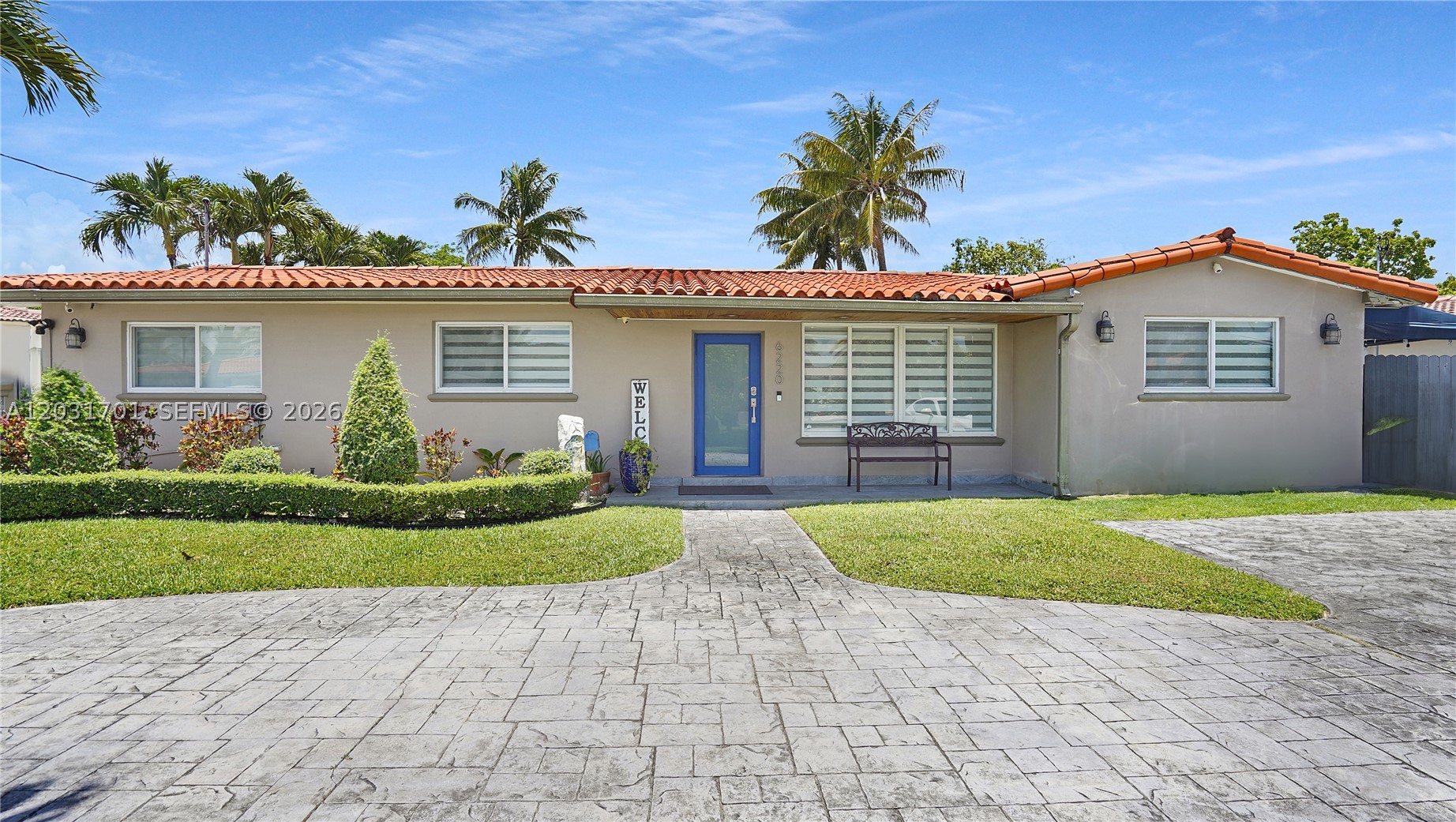 Spacious Lakefront Home in Highly Sought-After Lake Lawrence neighborhood of Hialeah. This professionally designed lakefront home offers custom-built features throughout. Boasting 3 bedrooms and 3.5 bathrooms, the home includes a spacious primary bedroom with a spa-like primary bath. The kitchen features custom-built wood cabinetry with German Blum stainless steel pull-out drawers, Blue Bahia granite countertops, top-of-the-line stainless steel appliances, and a cooking island for the chef in you. This smart home includes remote lighting throughout the entire home for added convenience. Enjoy afternoon sunsets overlooking the lake while relaxing in your swimming pool. The huge covered backyard patio is perfect for entertaining family and friends. 

This rare find is an opportunity not to be missed. Make this your home today.