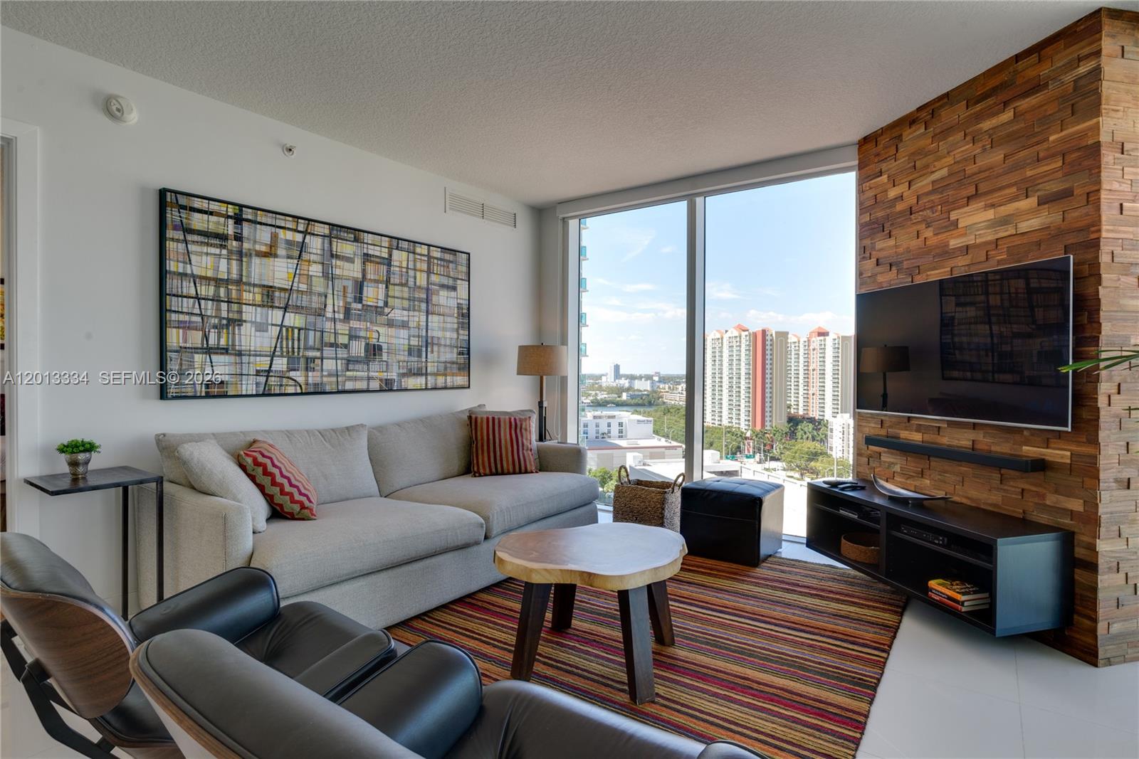 Welcome to luxurious living in the heart of Sunny Isles Beach! This fully furnished 3-bedroom, 2-bathroom unit at St. Tropez on the Bay boasts 1,458 square feet of modern elegance and breathtaking northern exposures. Floor-to-ceiling windows adorned with window treatments invite natural light, highlighting the sleek ceramic floors and stunning details throughout.
The spacious living area, enhanced by elegant chandeliers, flows seamlessly into a contemporary kitchen featuring granite countertops, a breakfast bar, cooktop, electric stove, and a suite of stainless steel appliances, including a dishwasher. Storage is abundant, with custom California closets to keep your space tidy and organized. The primary ensuite marble bathroom adds a touch of spa-like luxury, making every day feel like a retreat.
Step into a community that redefines convenience and comfort. The building includes an elevator, concierge and doorman services, assigned parking, valet parking, and guest parking options. Indulge in all the amenities this condo has to offer, from the heated pool set against picturesque views to a state-of-the-art gym, club house, and bike room. Designed with your lifestyle in mind, you’ll also enjoy access to a common media and recreation room, as well as private storage.
Conveniently located and thoughtfully designed, this condo is the epitome of modern coastal living. Don't miss your chance to call this exceptional property home – schedule a tour today and fall in love!